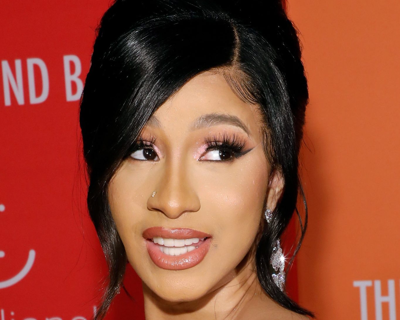 Platinum diamond nose ring and diamond statement earrings worn by Cardi B at the 5th Rihanna Diamond Ball