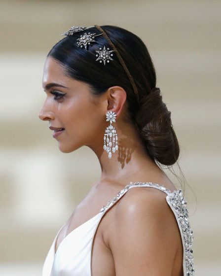 Diamond Tiaras: Deepika Padukone wearing a vintage star diamond tiara reversed over the top of her head at the 2017 Met Gala