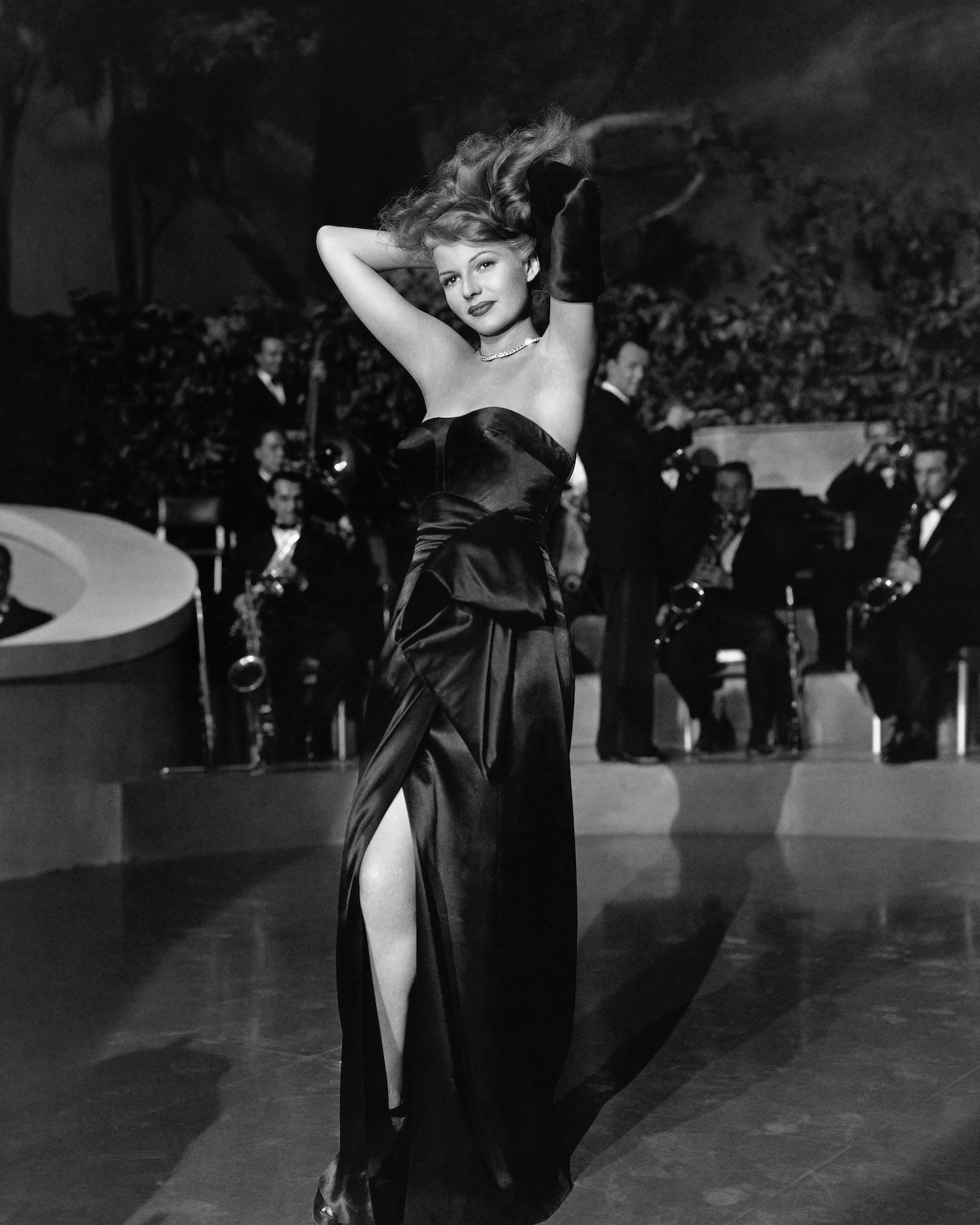 Rita Hayworth is shown in her sizzling performance in Gilda, with Glenn Ford, in 1946, while she is singing "Put The Blame on Mame, Boys." (Getty Images)