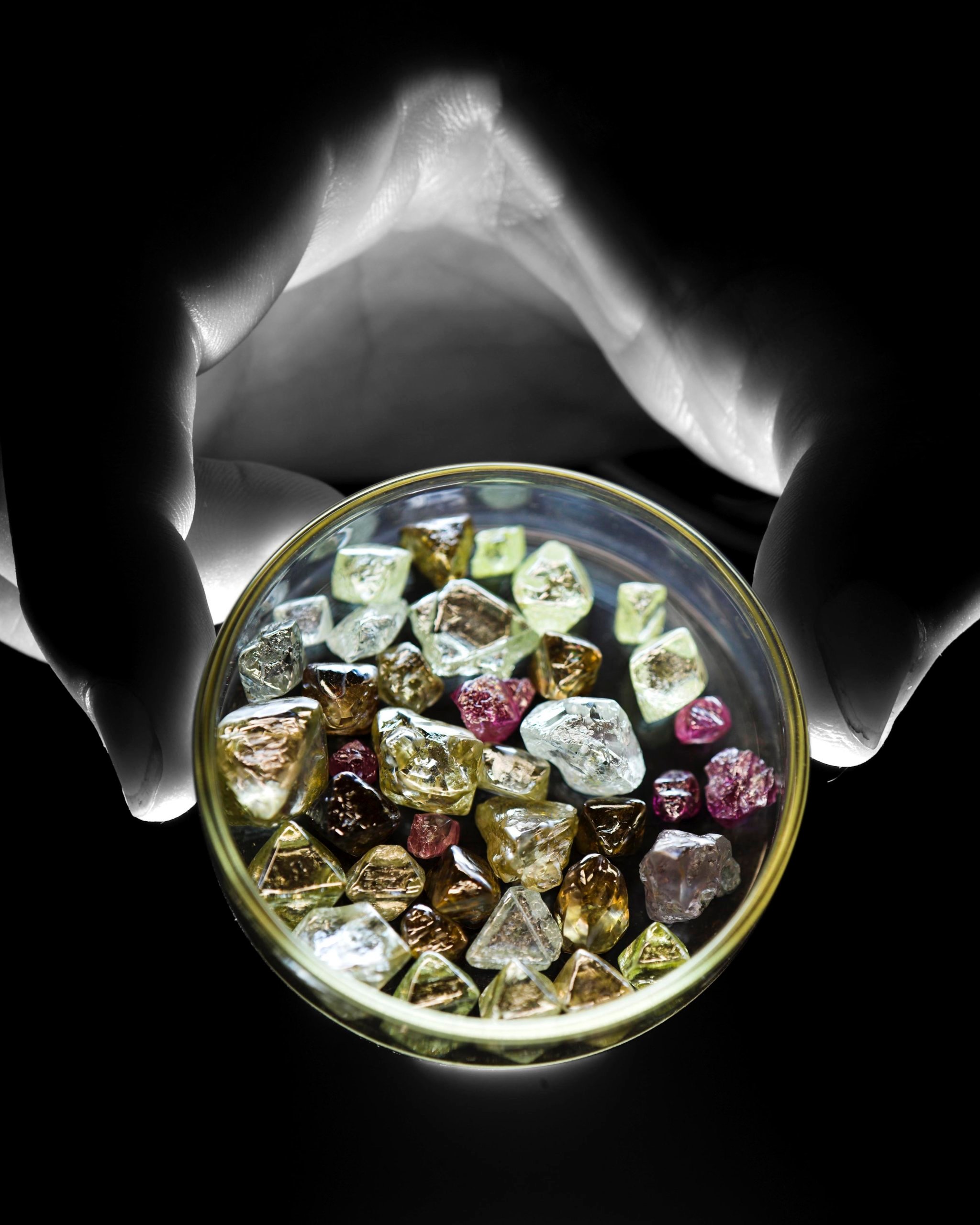 A rich palette of colourful, rough Argyle diamonds. (Courtesy of Rio Tinto)