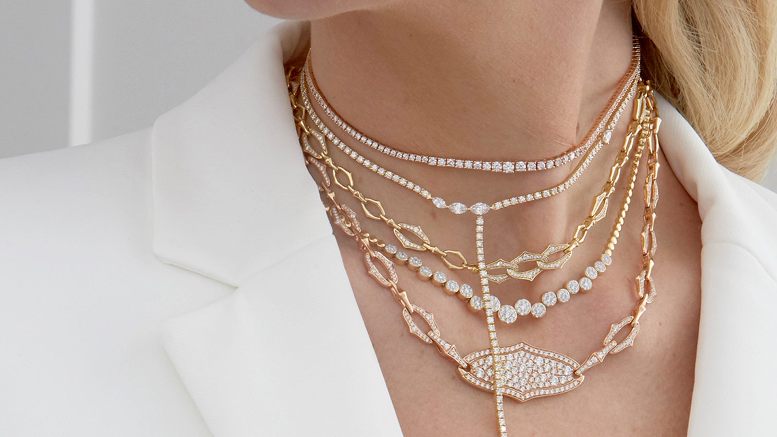 layered necklaces with diamonds