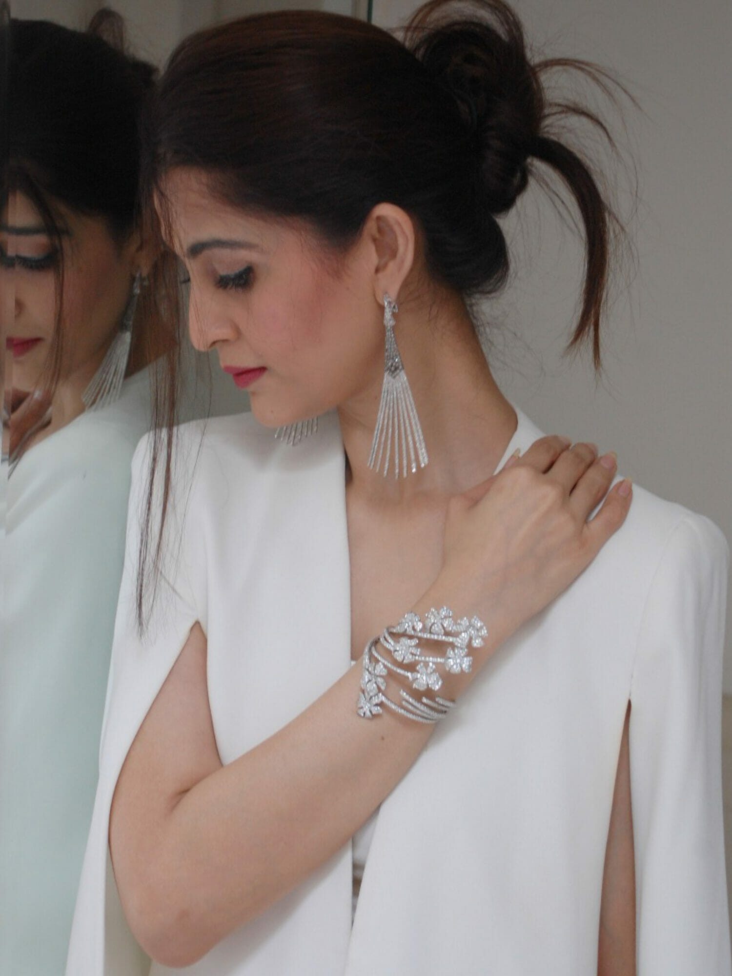 Aggarwal shows off her exquisite diamond-studded earrings, gifted to her by her parents on her 21st birthday and a floral design diamond bangle given to her by her husband on their first Valentine’s Day