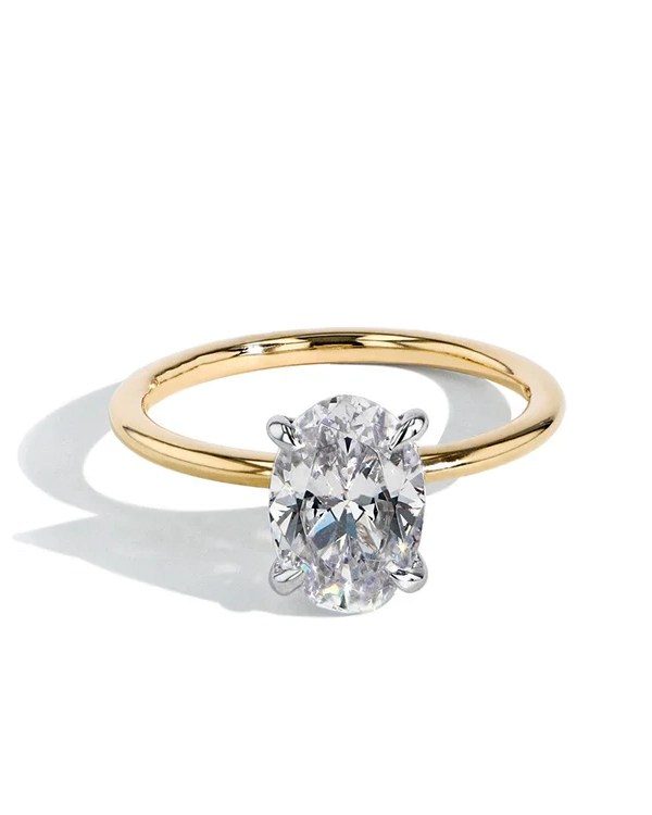 go slim with the band to make an engagement ring look bigger