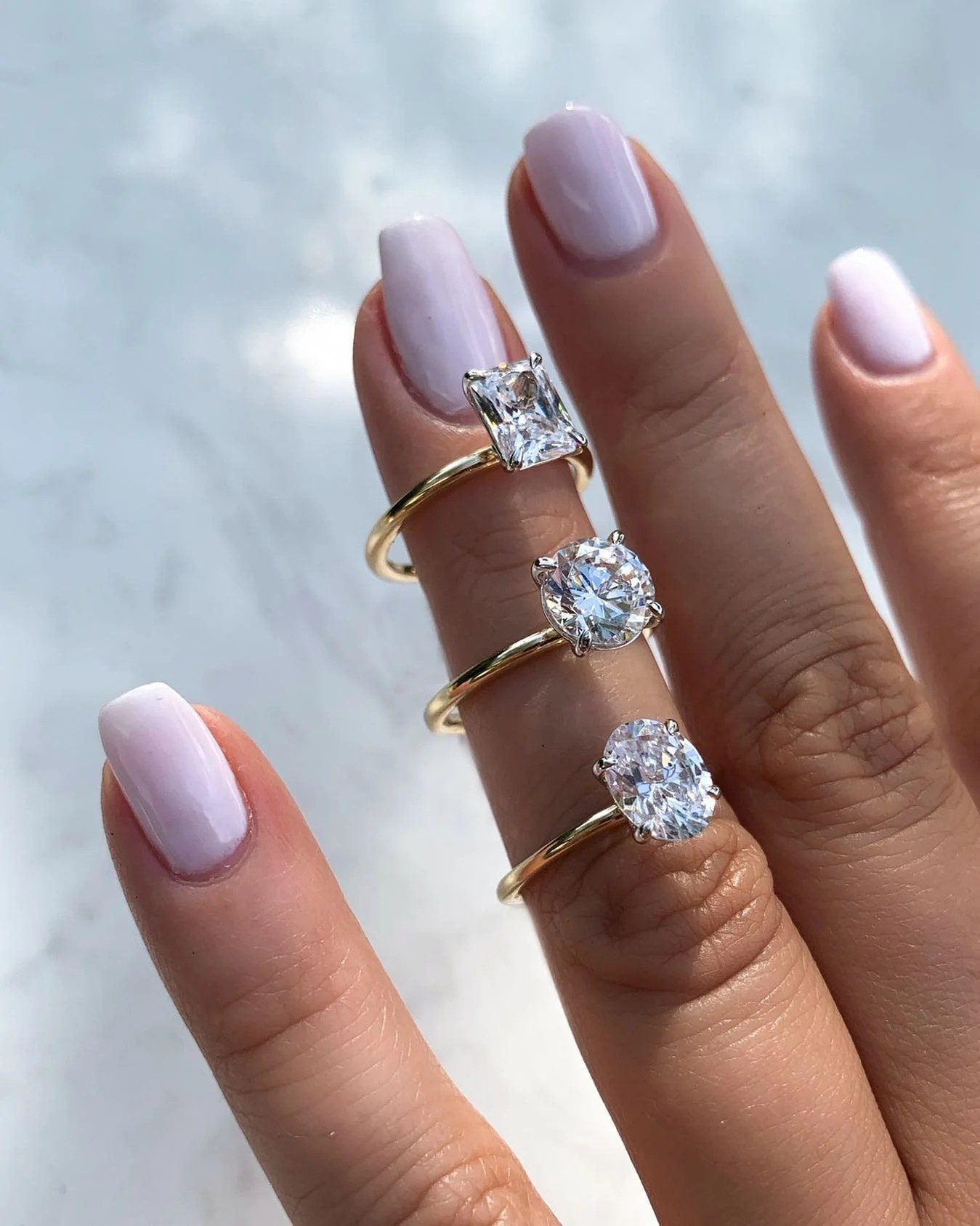 go slim with the band to make an engagement ring look bigger