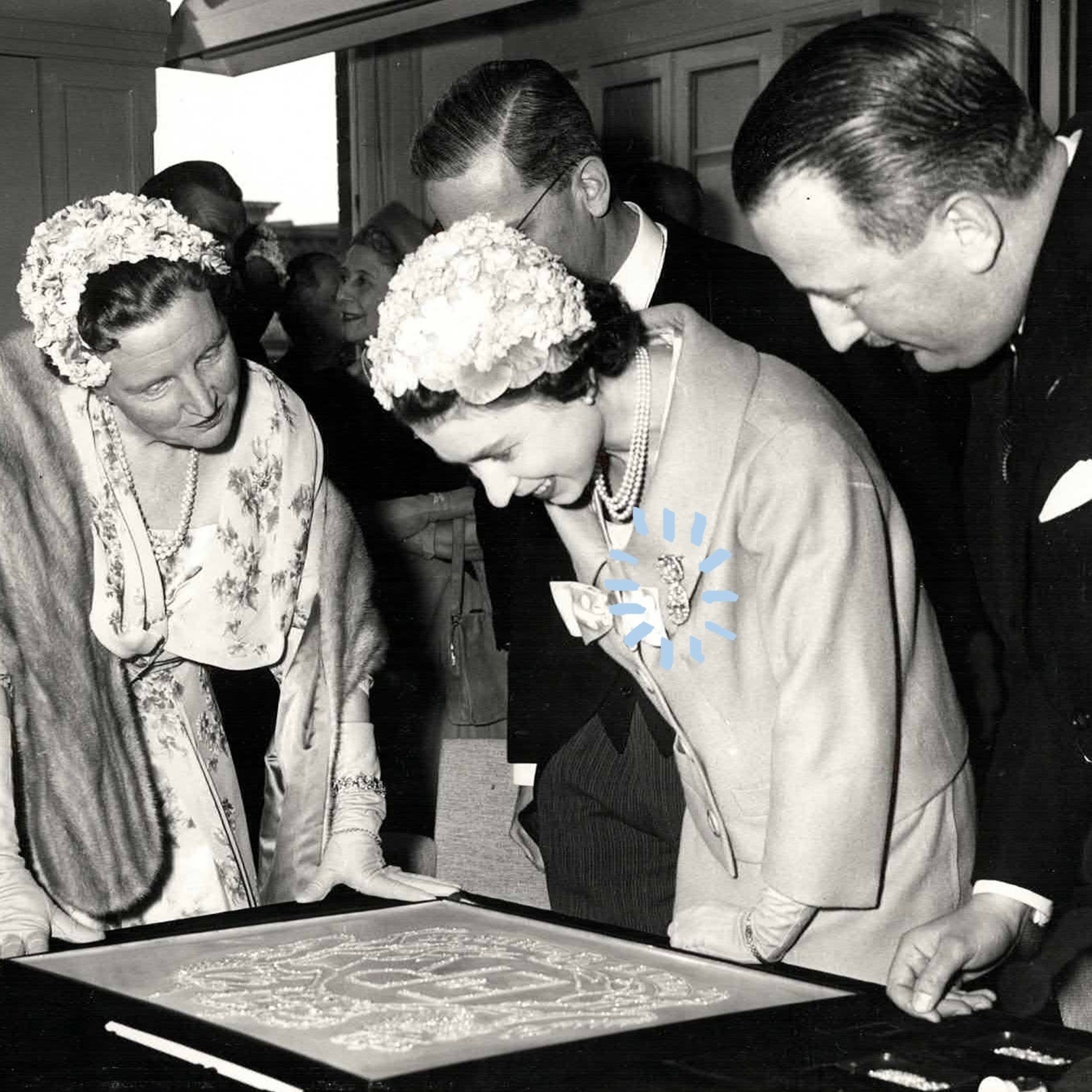 Queen Elizabeth II wearing her Granny’s Chips while visiting Louis Asscher in Amsterdam