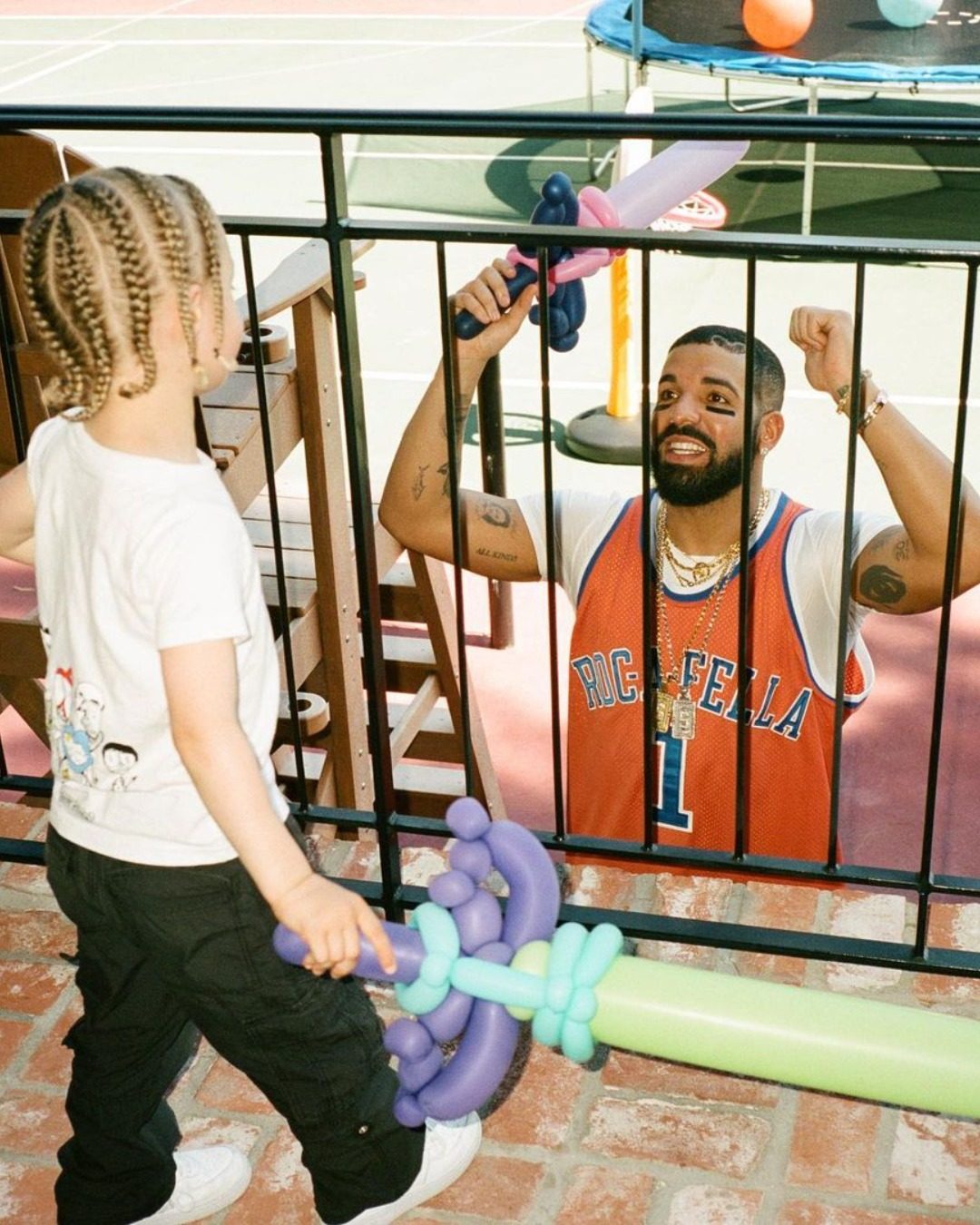 Drake styling diamond jewellery with his daughter