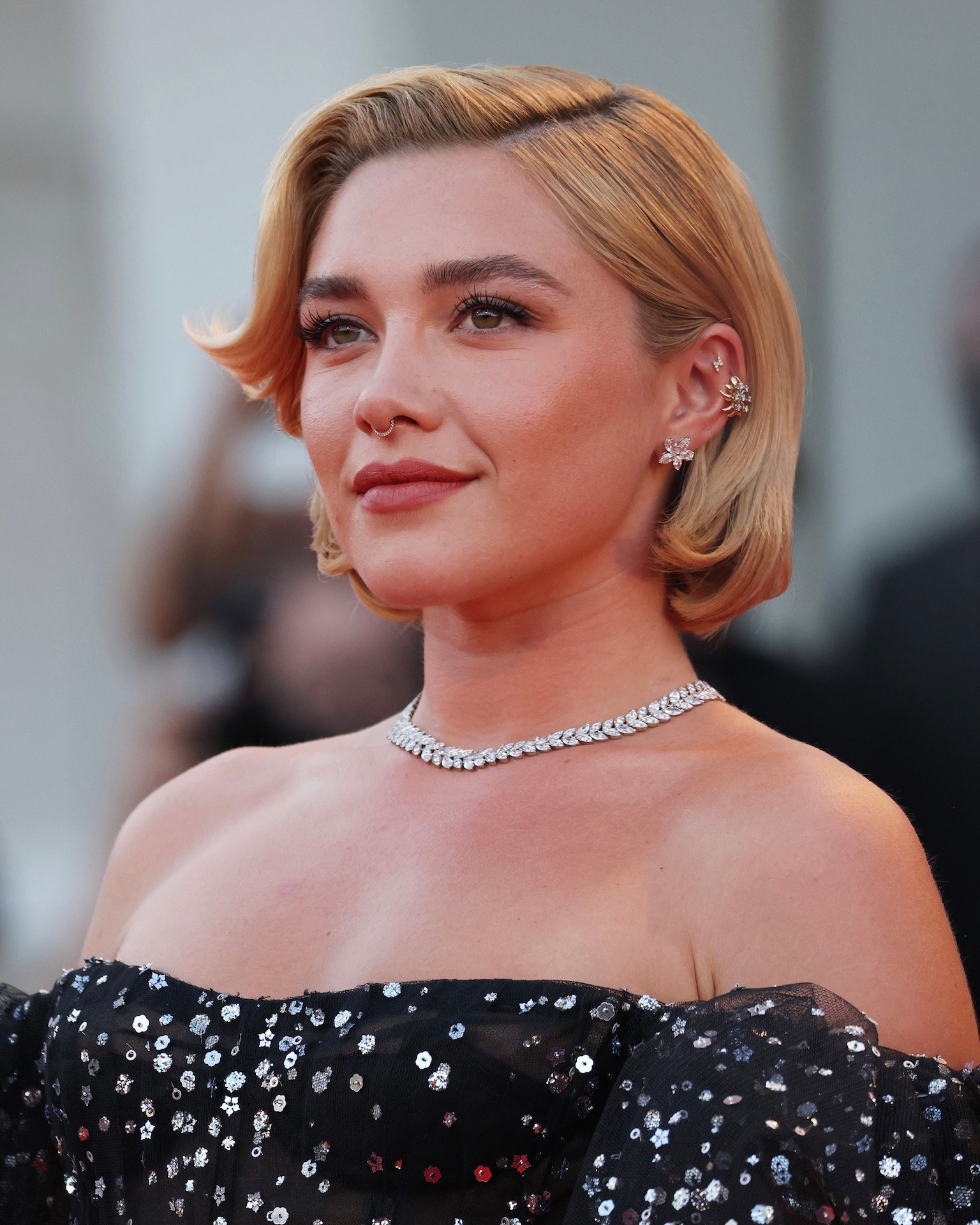 Florence Pugh attends the "Don't Worry Darling" red carpet at the 79th Venice Film Festival
