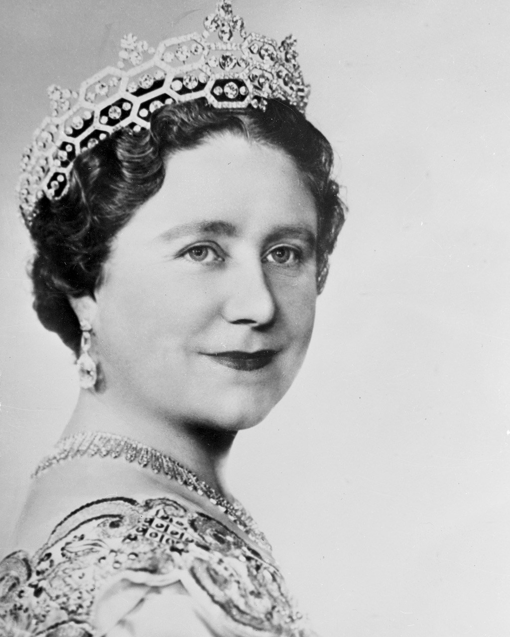 A portrait by Dorothy Wilding shows Britain's Queen Mother Elizabeth wearing the Greville Tiara.