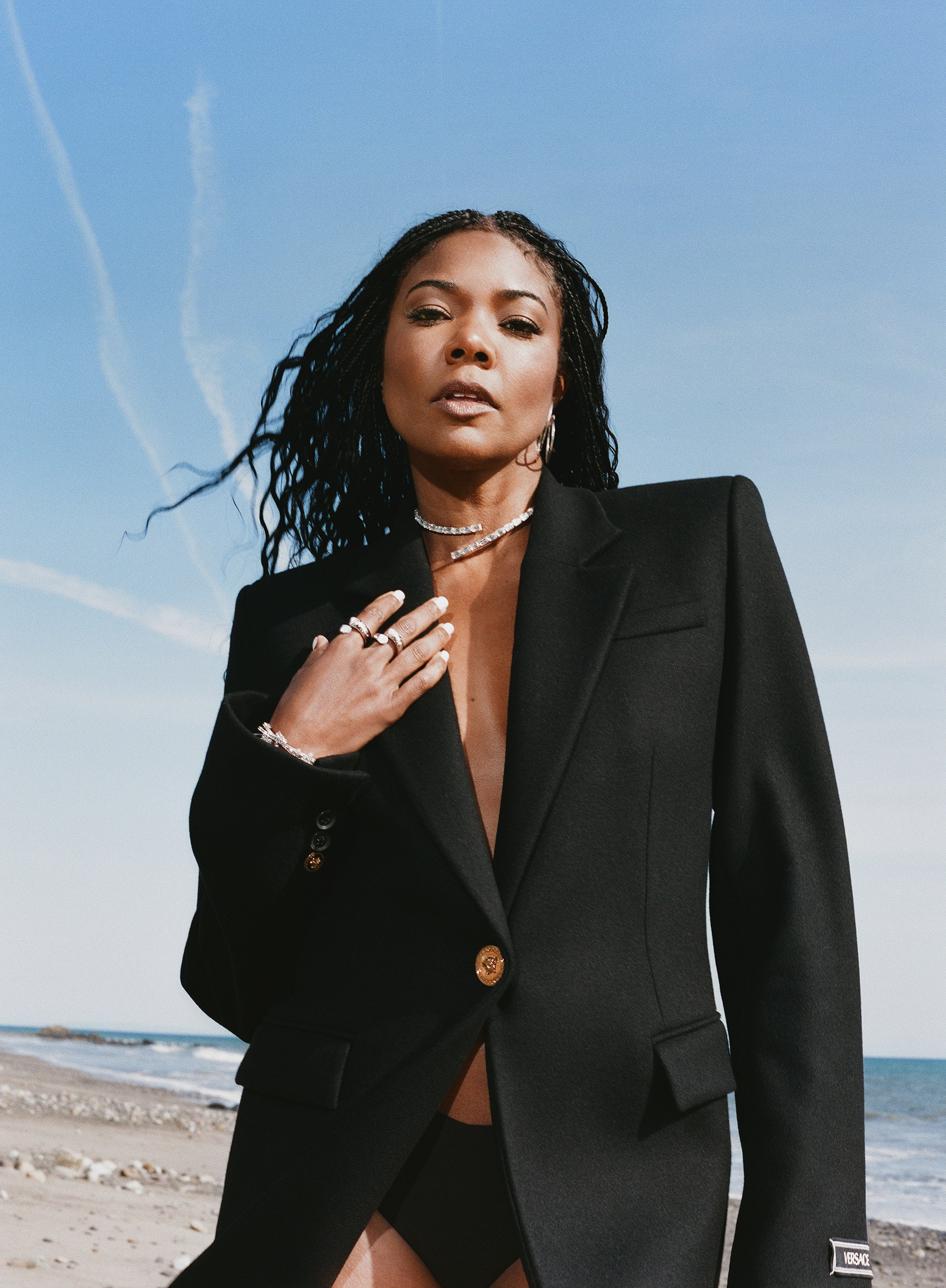 traveling with jewelry: Gabrielle Union on the beach
