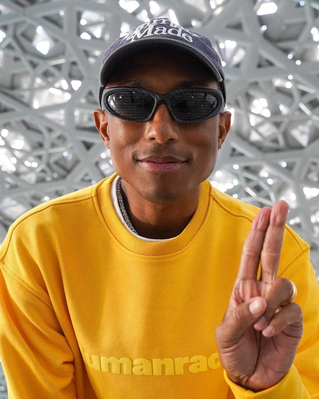Pharell wearing diamond necklace
