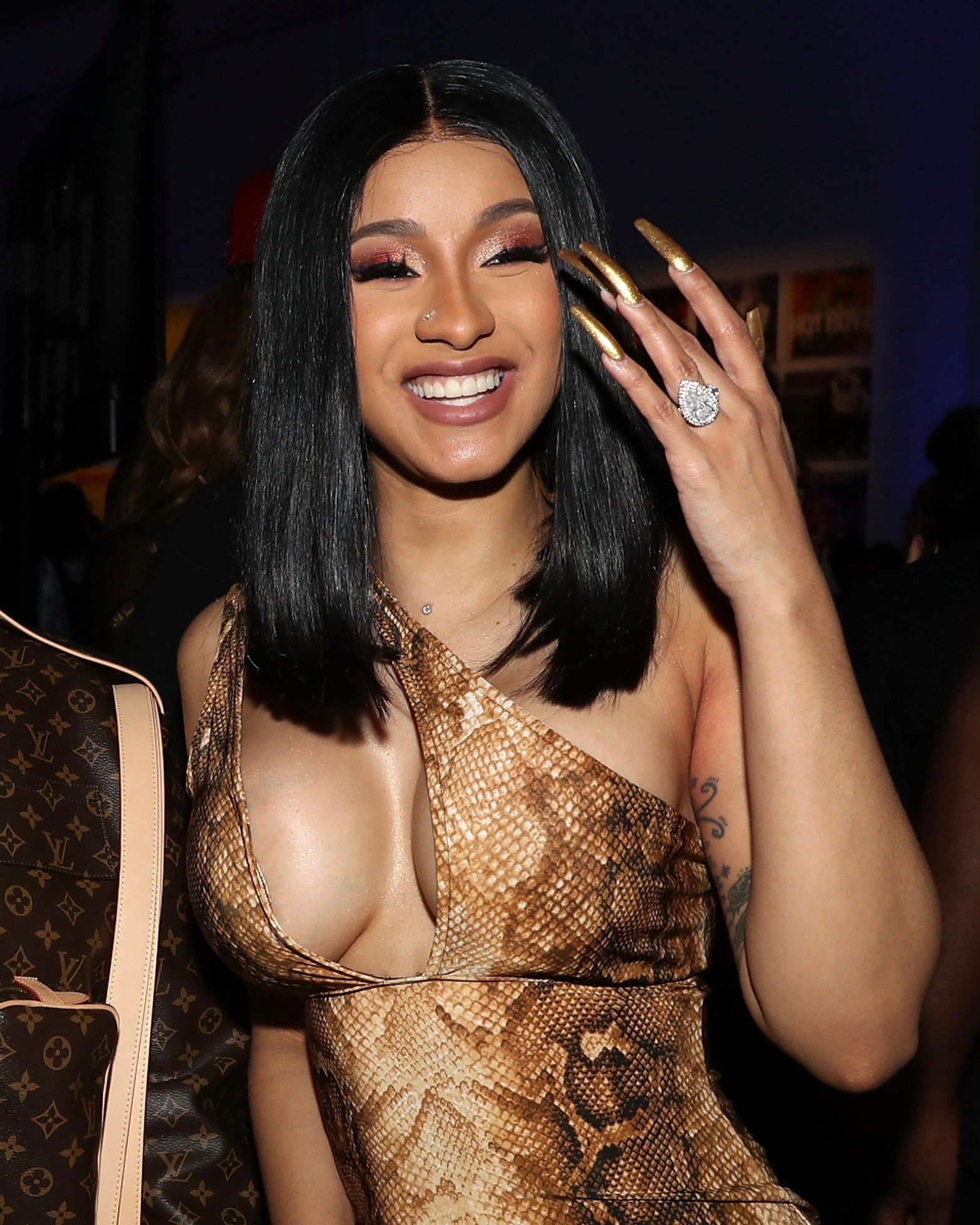 Cardi B wears her pear-shaped diamond engagement ring from Offset in 2019 in New York City. (Getty Images)