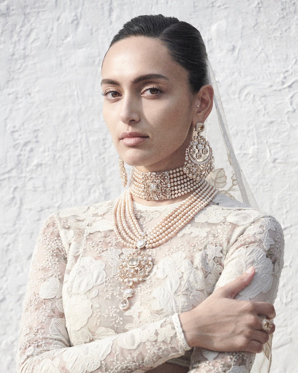 Mughal Empire Jewelry Indian Wedding Jewelry A model wears the Sabyasachi ‘Bengal Royale’ Collection High Jewelry Earrings with Brilliant-Cut Diamonds, Pearls, and Organic Gemstones, Set in Gold