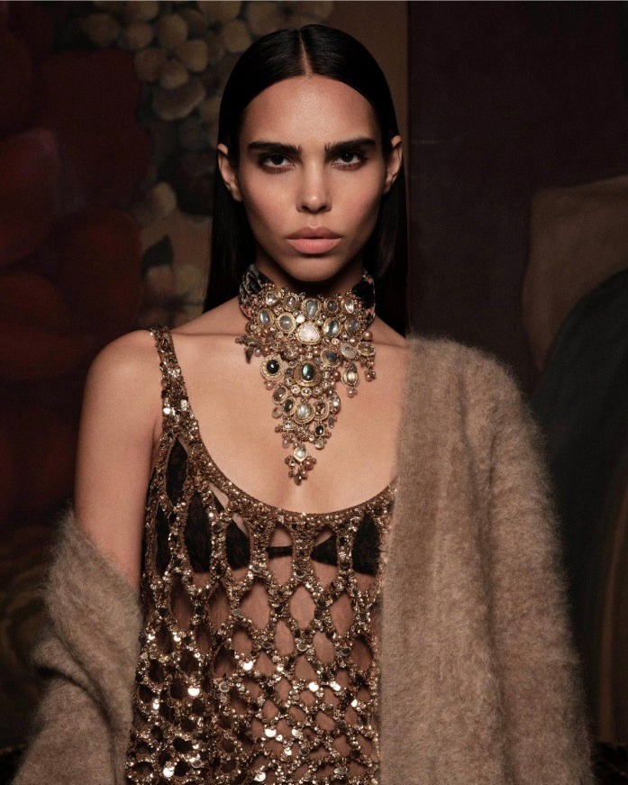 Mughal Empire Jewelry Indian Wedding Jewelry A model wears the Sabyasachi Diamond and Gemstone Deconstructed Maharani Necklace tied with a signature printed velvet sash