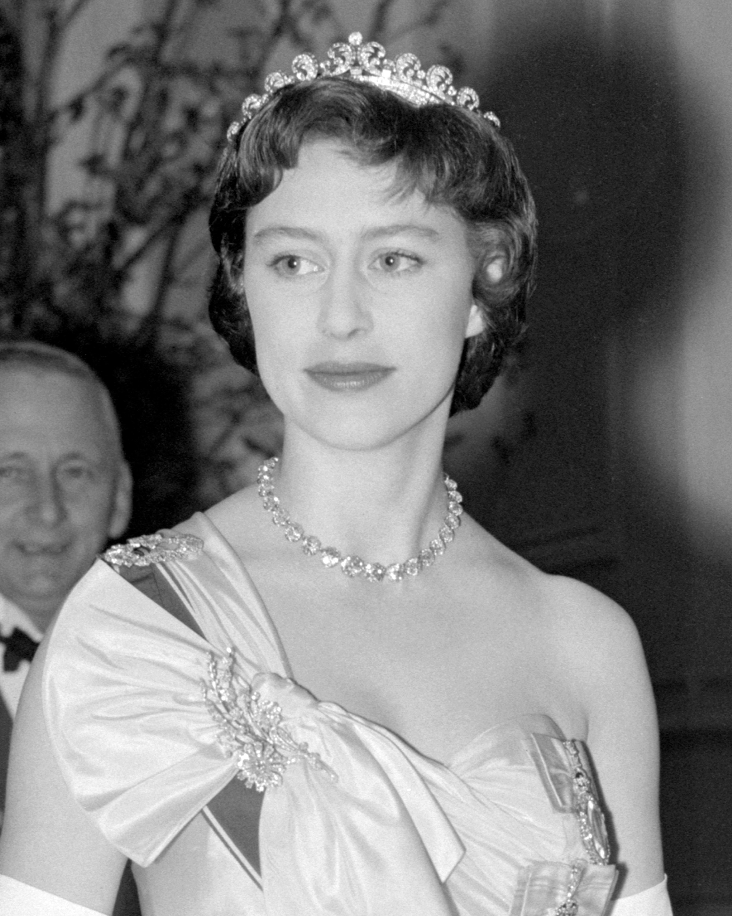 Princess Margaret wears The Cartier Halo Scroll Tiara