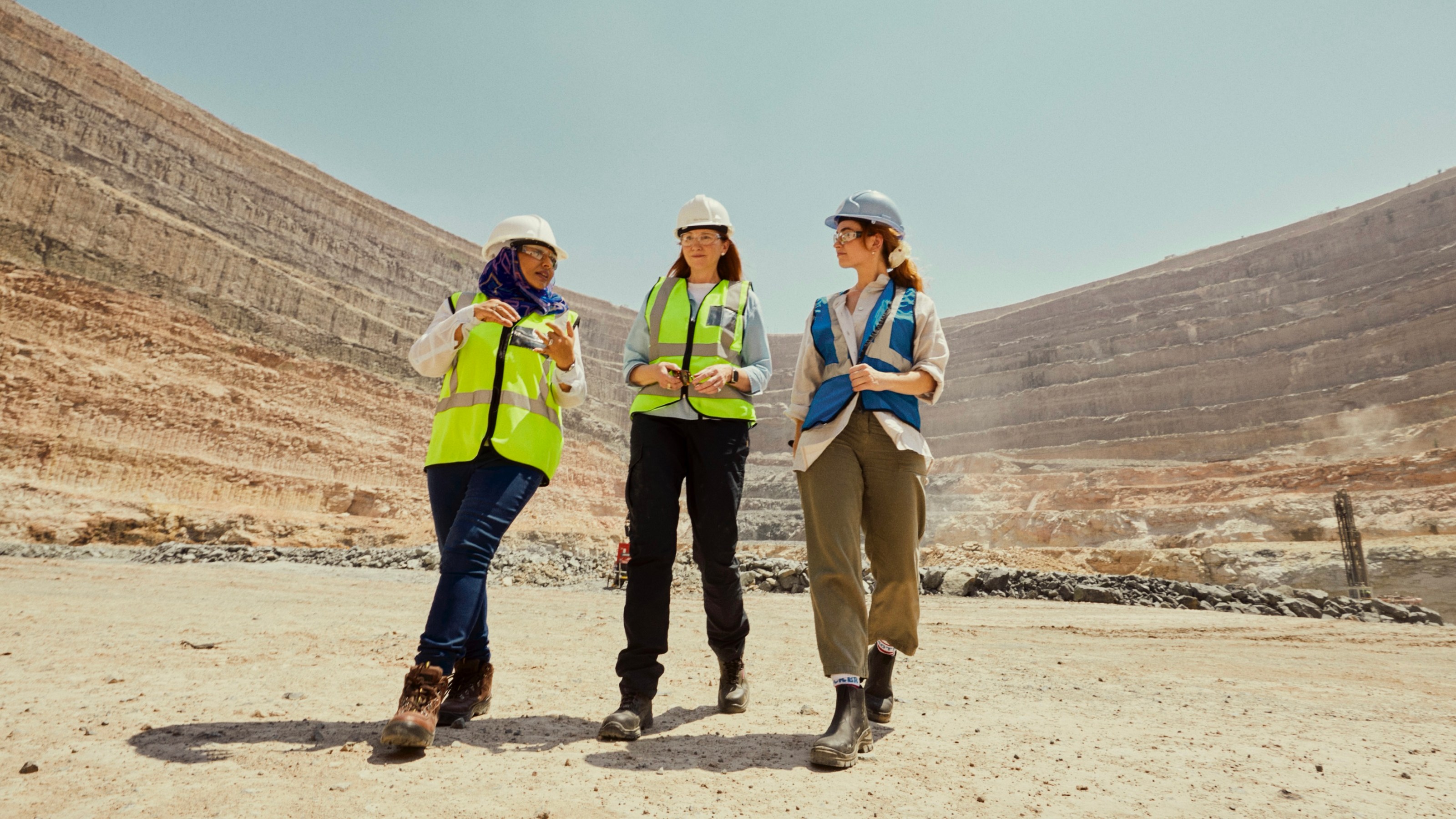 Lily James with Eira Thomas, CEO Lucara Diamond Corp, and Naseem Lahri, Managing Director, at the Karowe Diamond Mine. lily james botswana diamonds