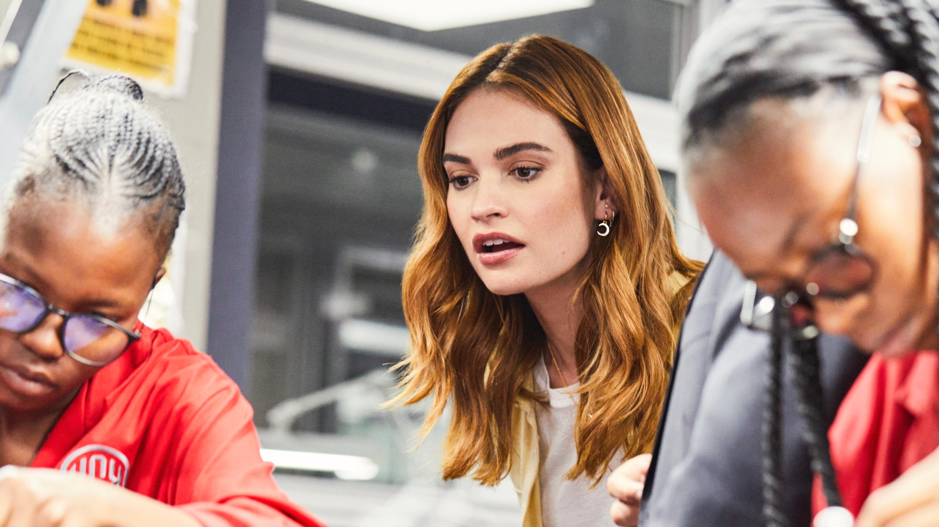 Lily James with diamond cutters at KGK Diamonds. lily james botswana diamonds