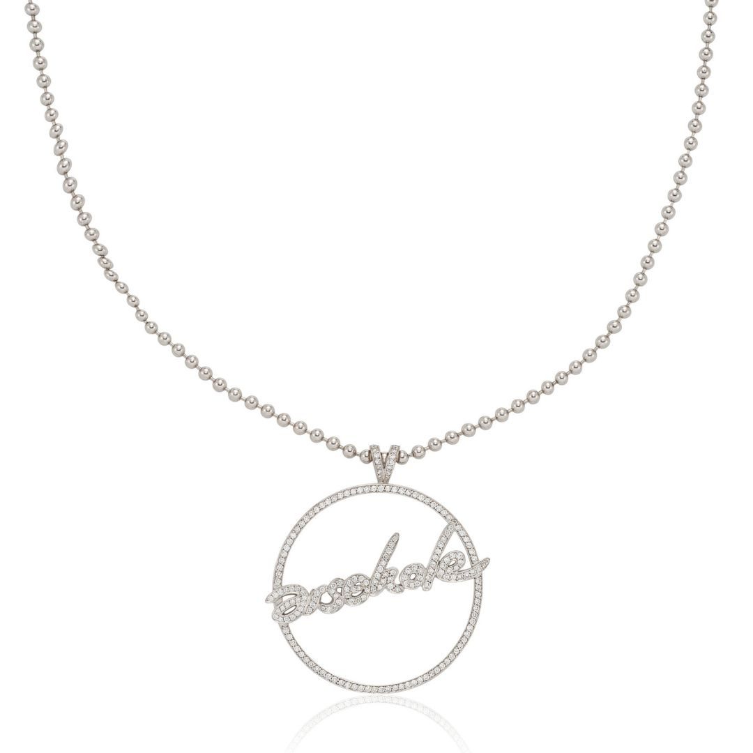 Elton John's "Arsehole" Pendant by Theo Fennel
