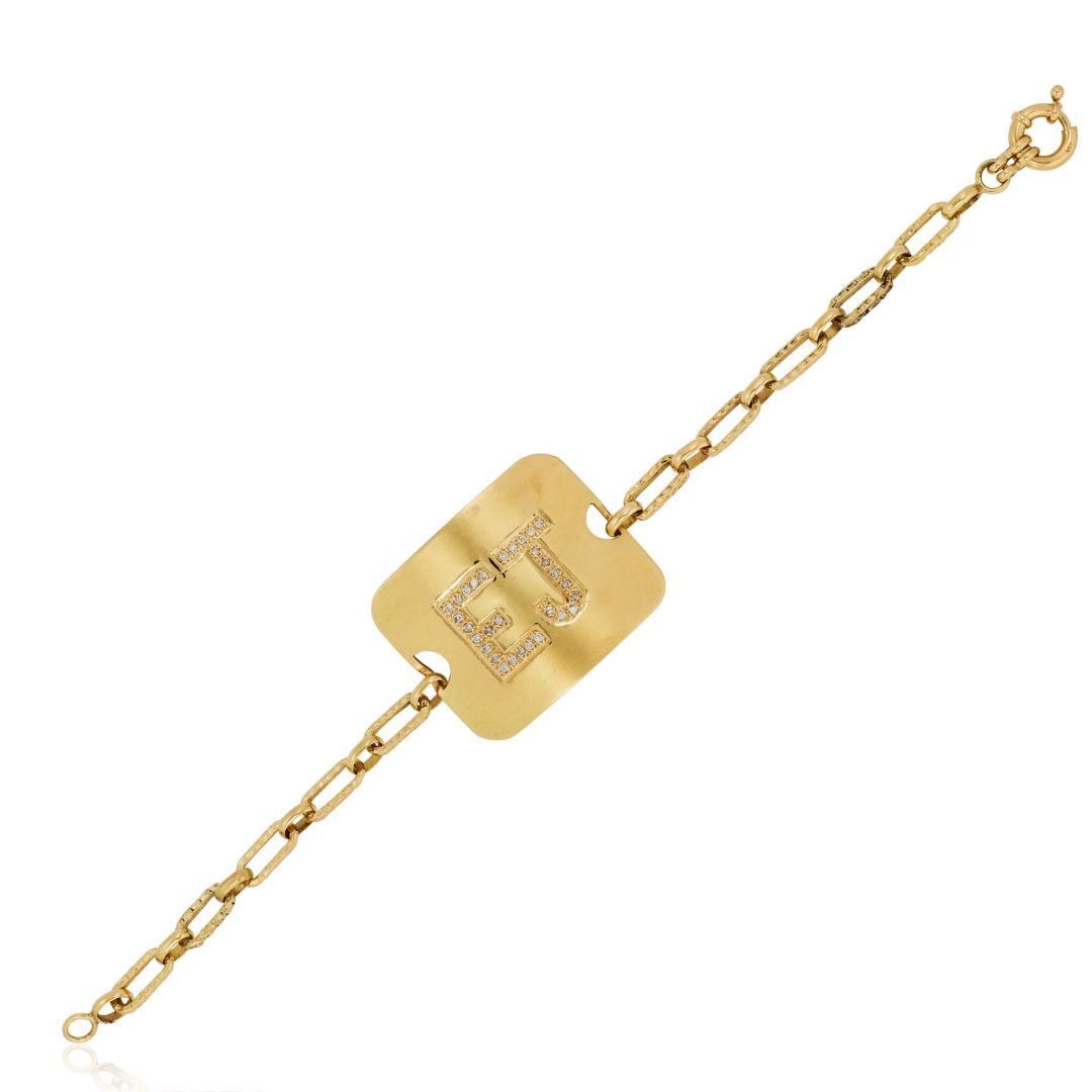 Elton John's Diamond and Gold "EJ" Bracelet