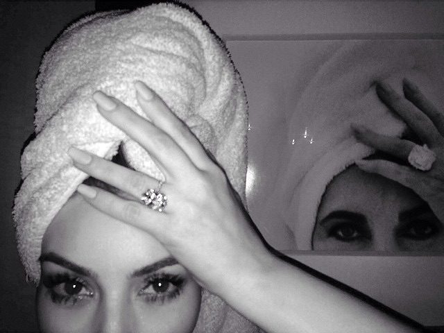 Kim Kardashian posted a side-by-side of herself and Elizabeth Taylor on Instagram with the caption, "#MyIdol💍" on December 10, 2013.