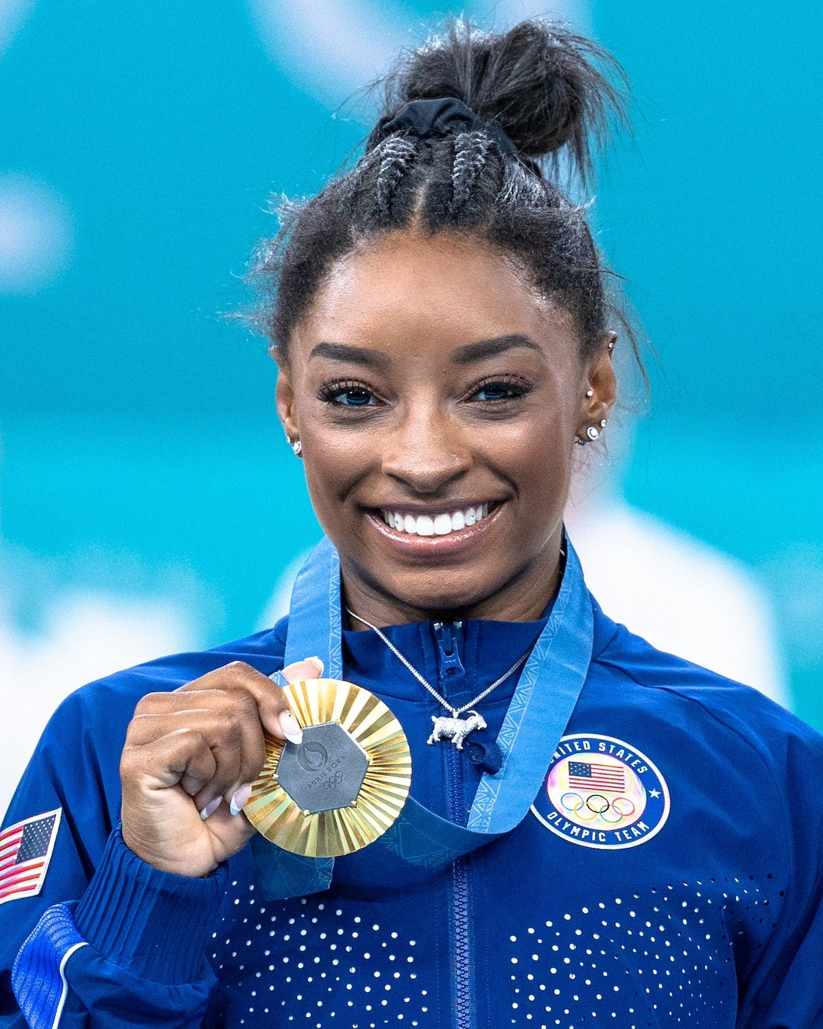 The Best Celebrity Natural Diamond Moments from 2024: US athlete Simone Biles poses on the podium at the artistic gymnastics women's all-around final of the Paris 2024 Olympic Games in Paris, France.