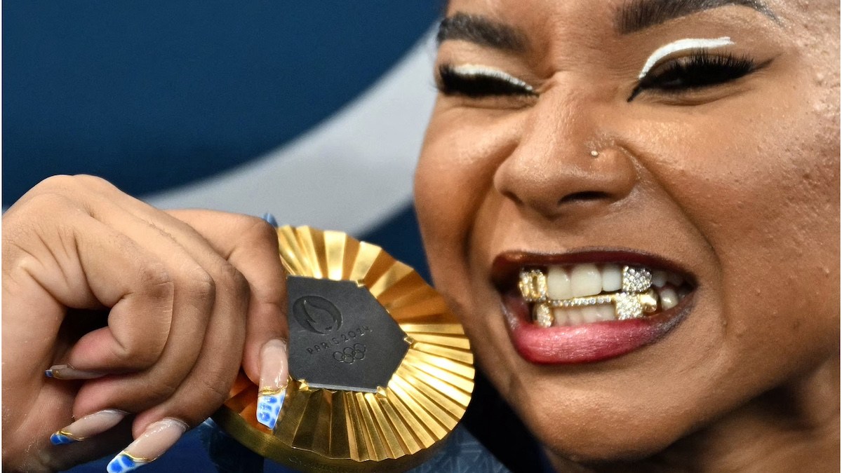 Jordan Chiles flashes natural diamond grillz alongside new Olympic Gold Medal