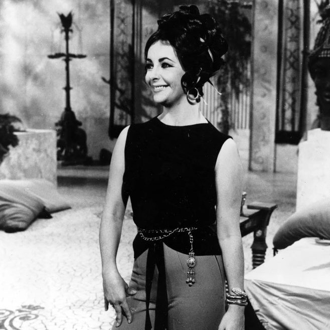 Elizabeth Taylor wearing a Bulgari 'Serpenti' watch while filming Cleopatra at Cinecitta Studio in Rome, 1962. (Courtesy of Bulgari)