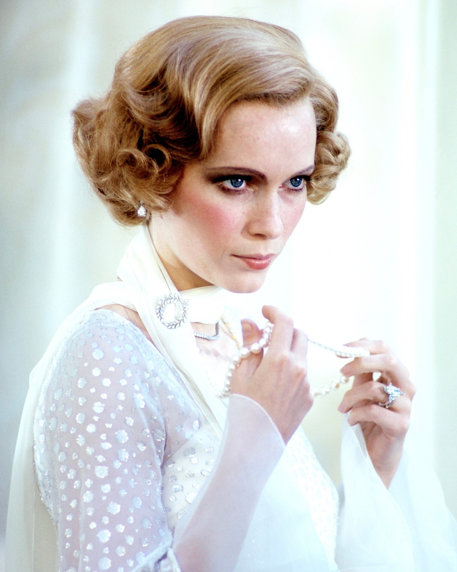 Actress Mia Farrow wears Cartier diamond jewelry as Daisy Buchanan in the film, The Great Gatsby, 1974. (Getty Images)