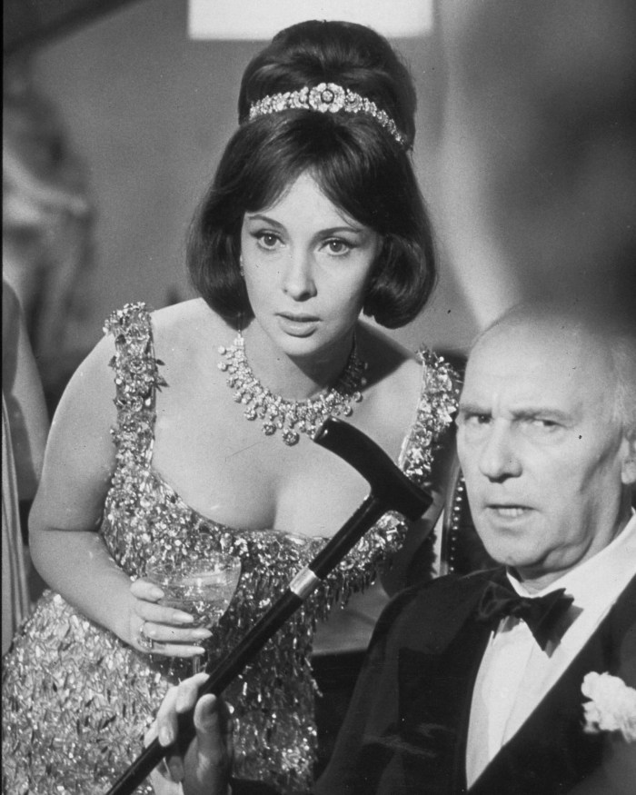 Famous Movie Jewelry: Gina Lollobrigida wore Bulgari diamonds alongside Ralph Richardson in ‘Woman Of Straw’ in 1964. (Photo by Michael Ward/Getty Images)