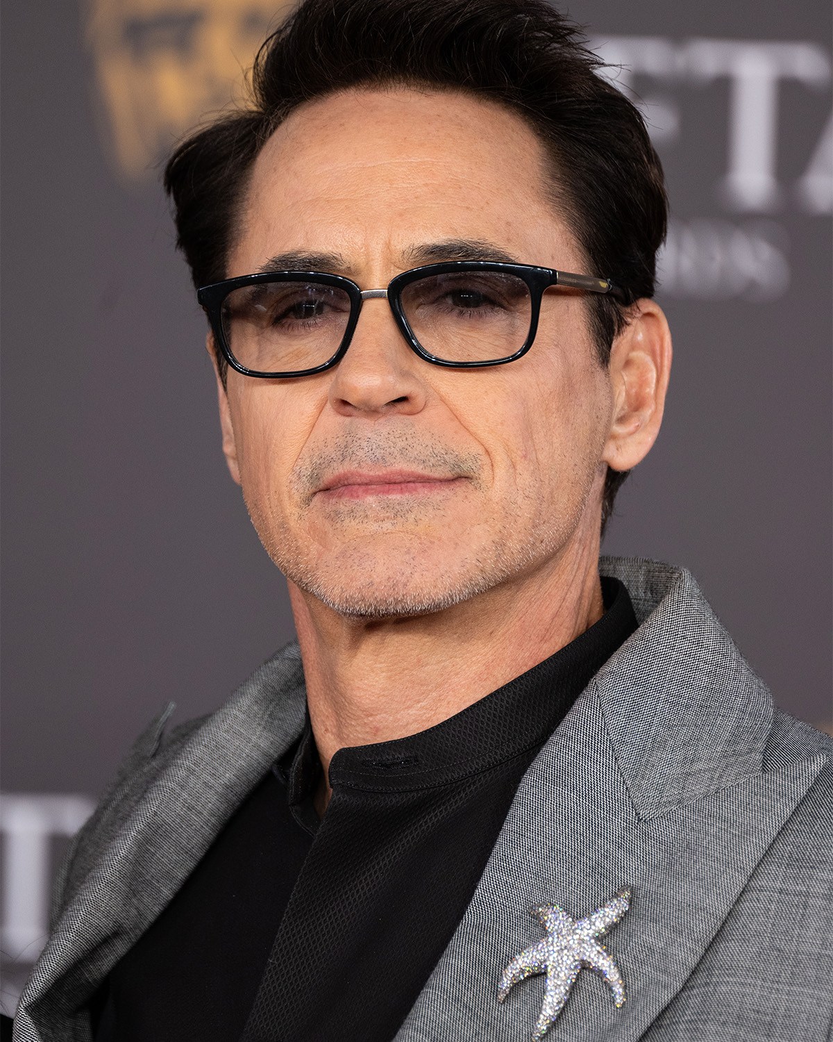 2024's Hottest Men in Diamonds: Robert Downey Jr. at the 2024 BAFTA Awards.