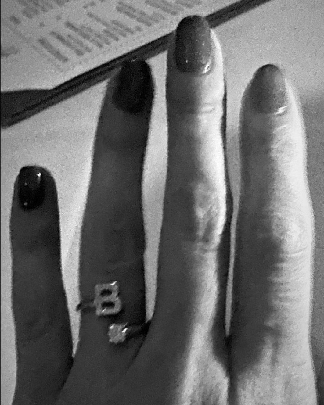 Selena Gomez wearing a pavé diamond “B” ring by Jacquie Aiche, an early tribute to Benny Blanco. (instagram.com/selenagomez)