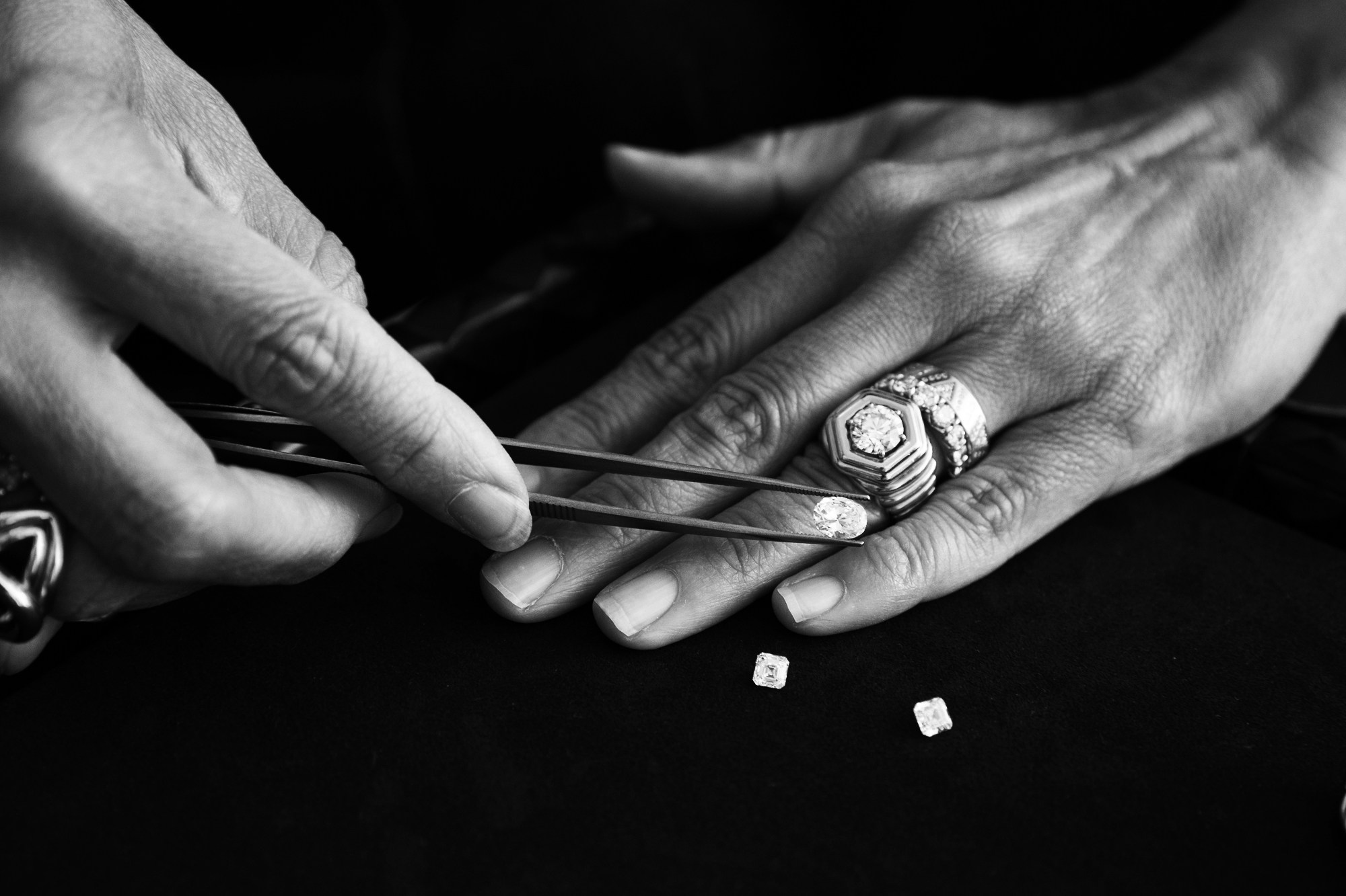 Jewelry designer Lauren Harwell Godfrey inspects natural diamonds in her Marin, California studio.