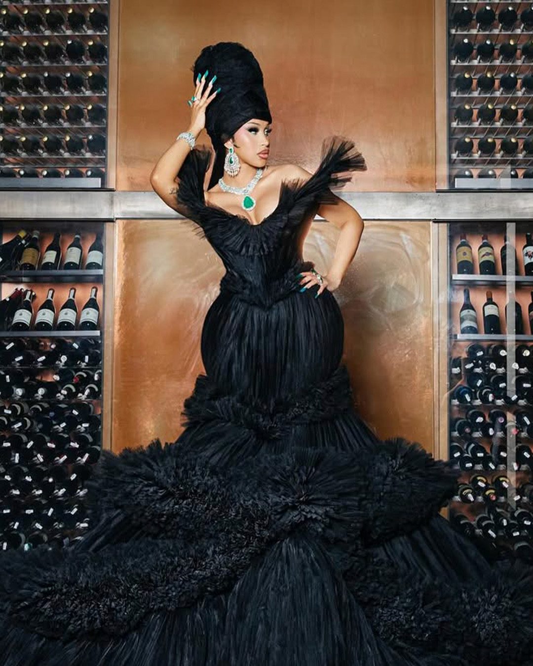 Cardi B wearing Kamyen jewellery with emerald and diamond pieces at the MET Gala.