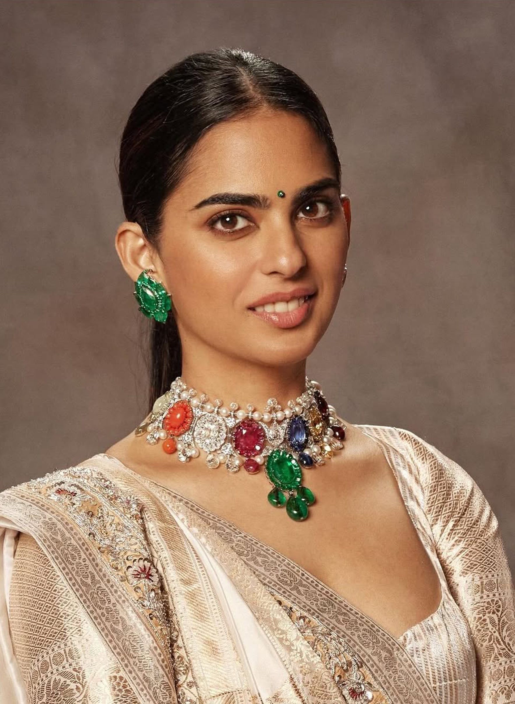 Isha Ambani wearing Navratan necklace