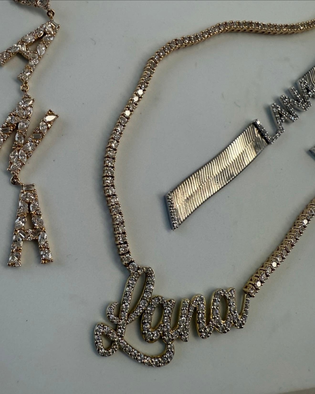 Sza's diamond name necklace