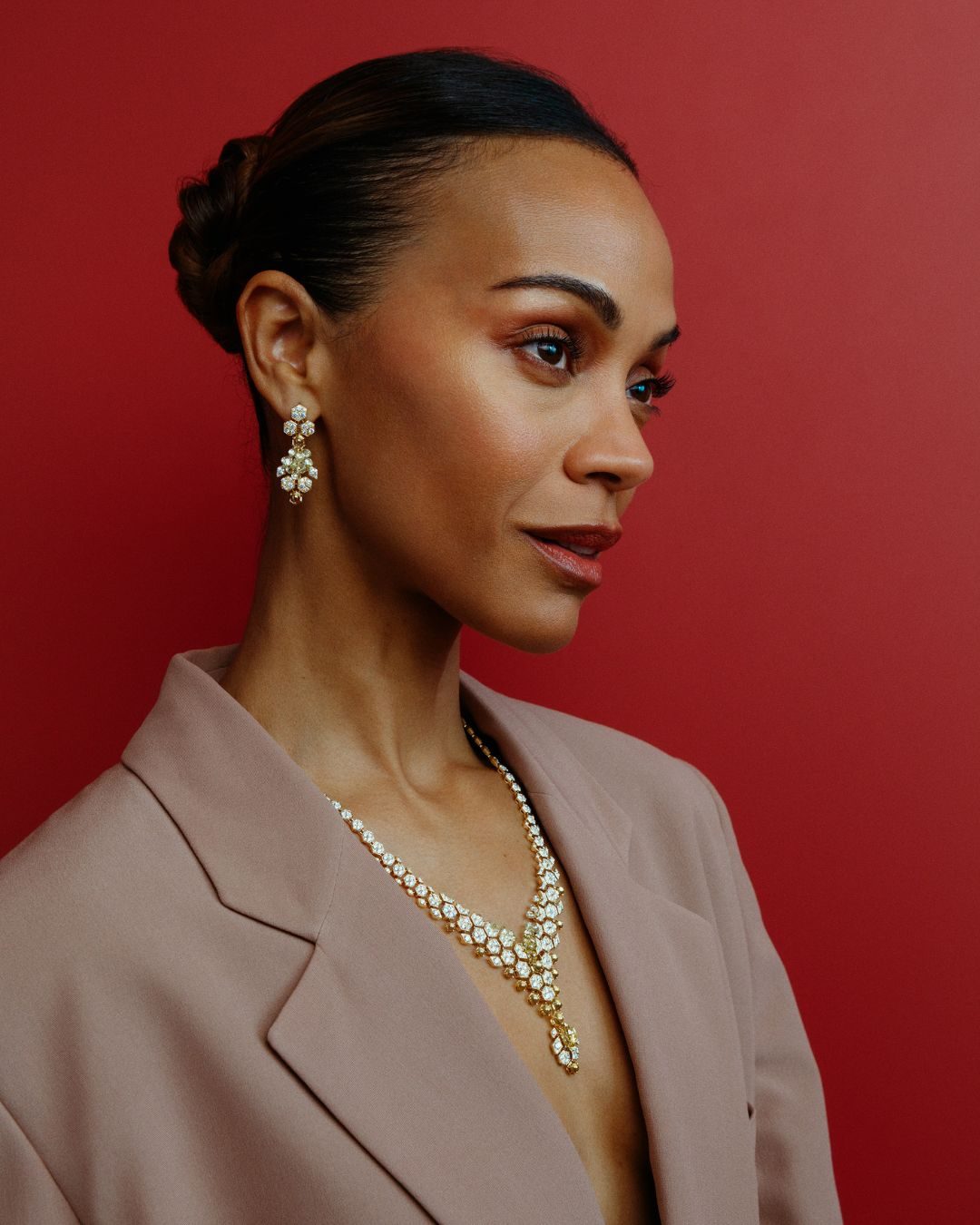 Insect Jewelry Zoë Saldaña wears the Cartier Melis Necklace from the third chapter of the Nature Sauvage High Jewelry Collection. (Charlie Clift, Courtesy of Cartier)