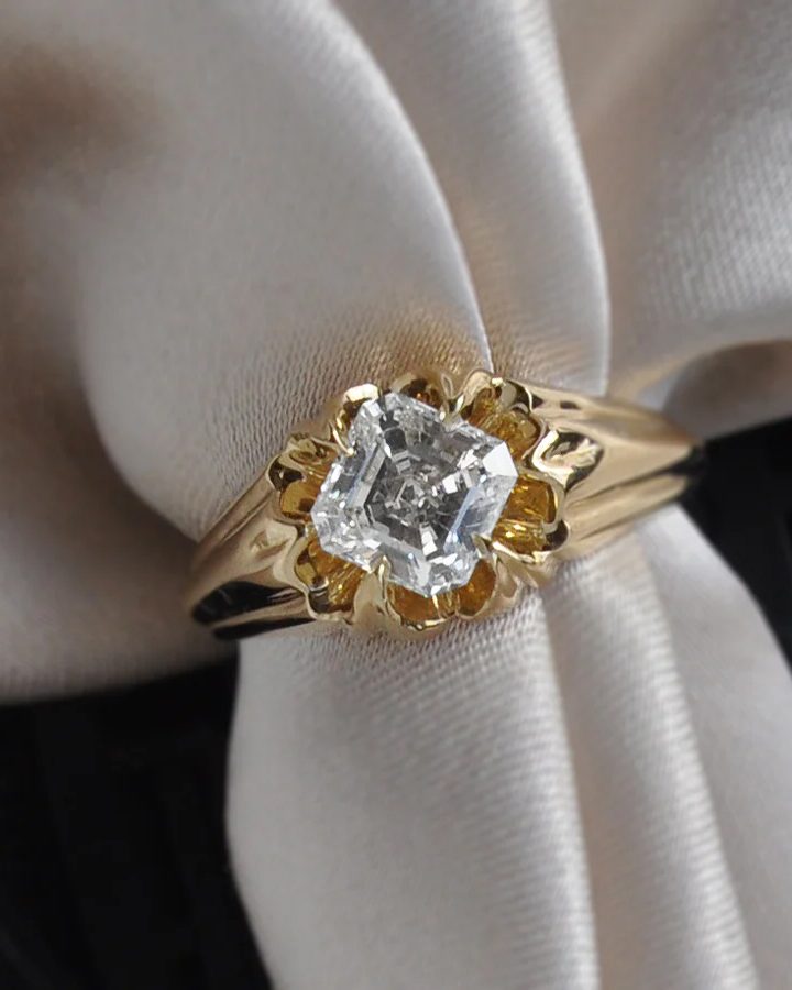 gold engagement ring with asscher diamond