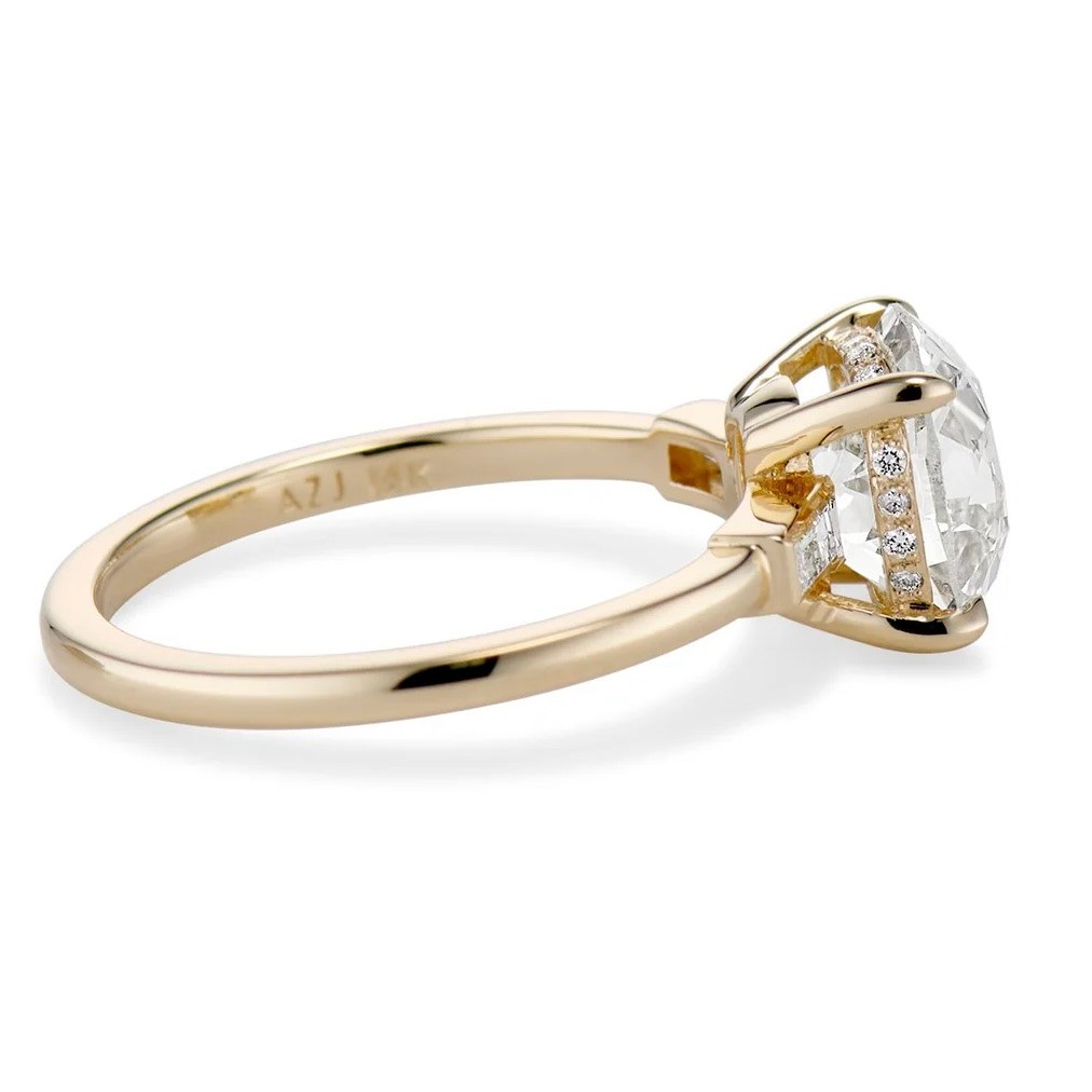 a diamond ring with a hidden halo setting