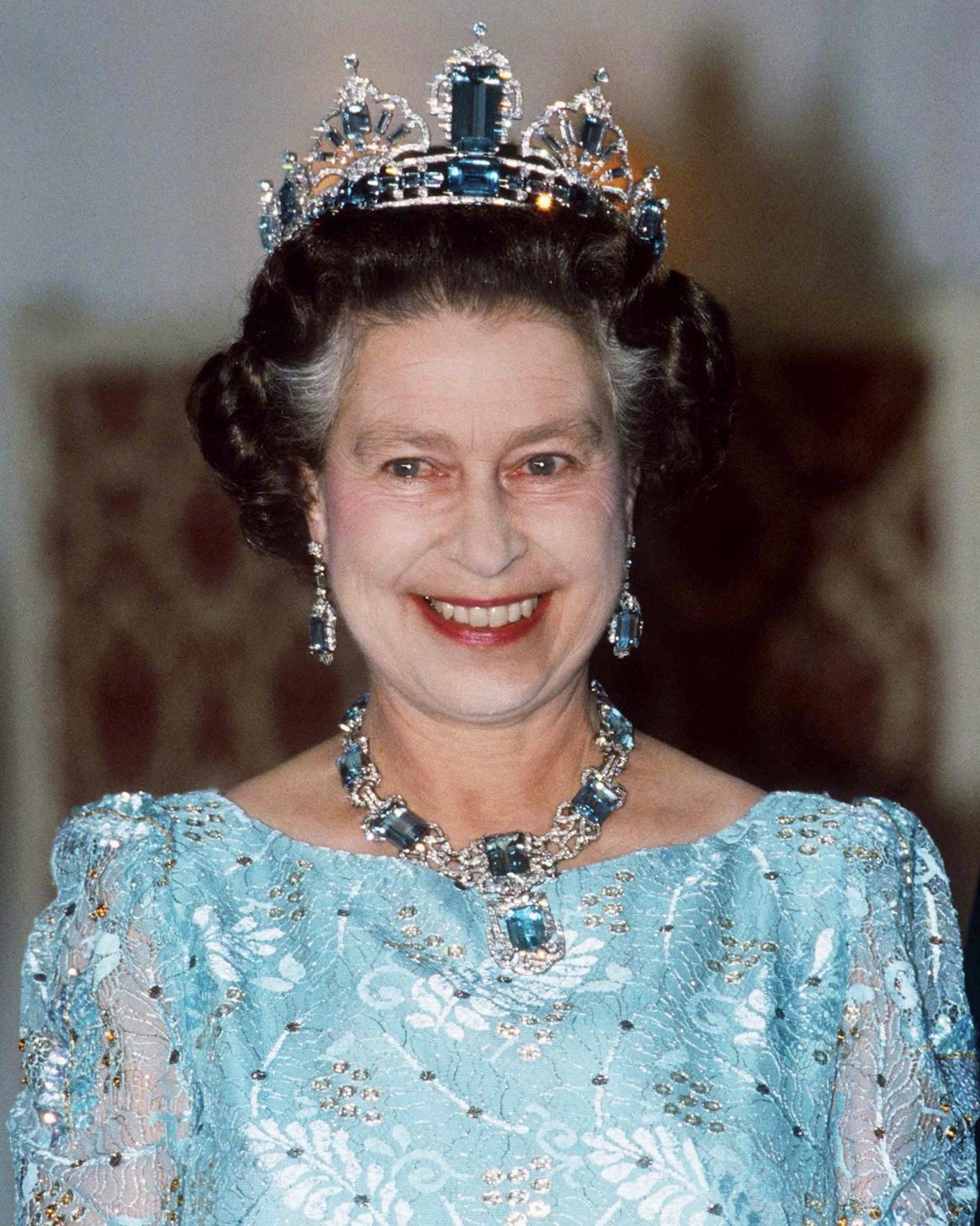 Queen Elizabeth II: Her Life in Style Queen Elizabeth II wears the Brazilian Aquamarine tiara, with a matching necklace and earrings, given to her by the People Of Brazil.