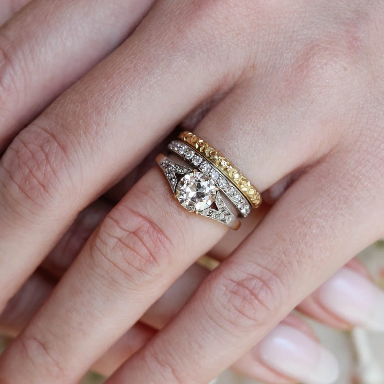 Candlelight diamonds: Old European cut diamond vintage ring on hand.