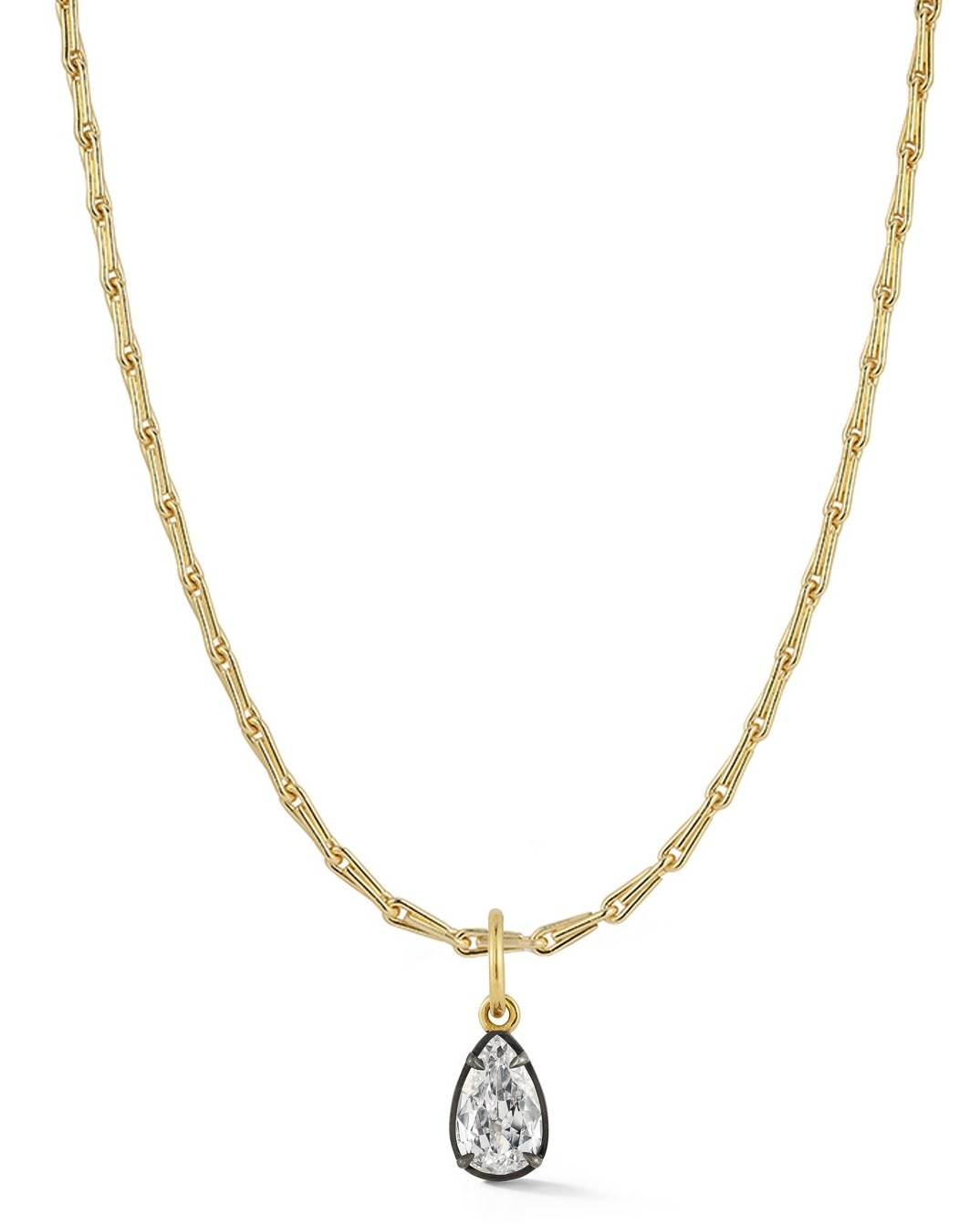 Sarah Jessica Parker as Carrie Bradshaw in 'And Just Like That' wearing the a pear shaped diamond necklace from Jemma Wynne.
