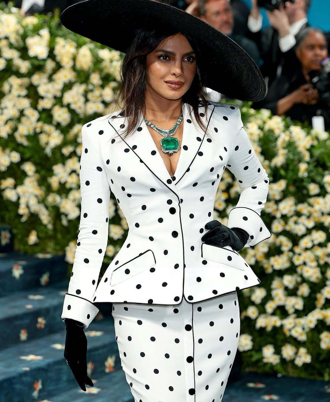 Priyanka Chopra in Bulgari necklace with 241-carat emerald and diamonds.
