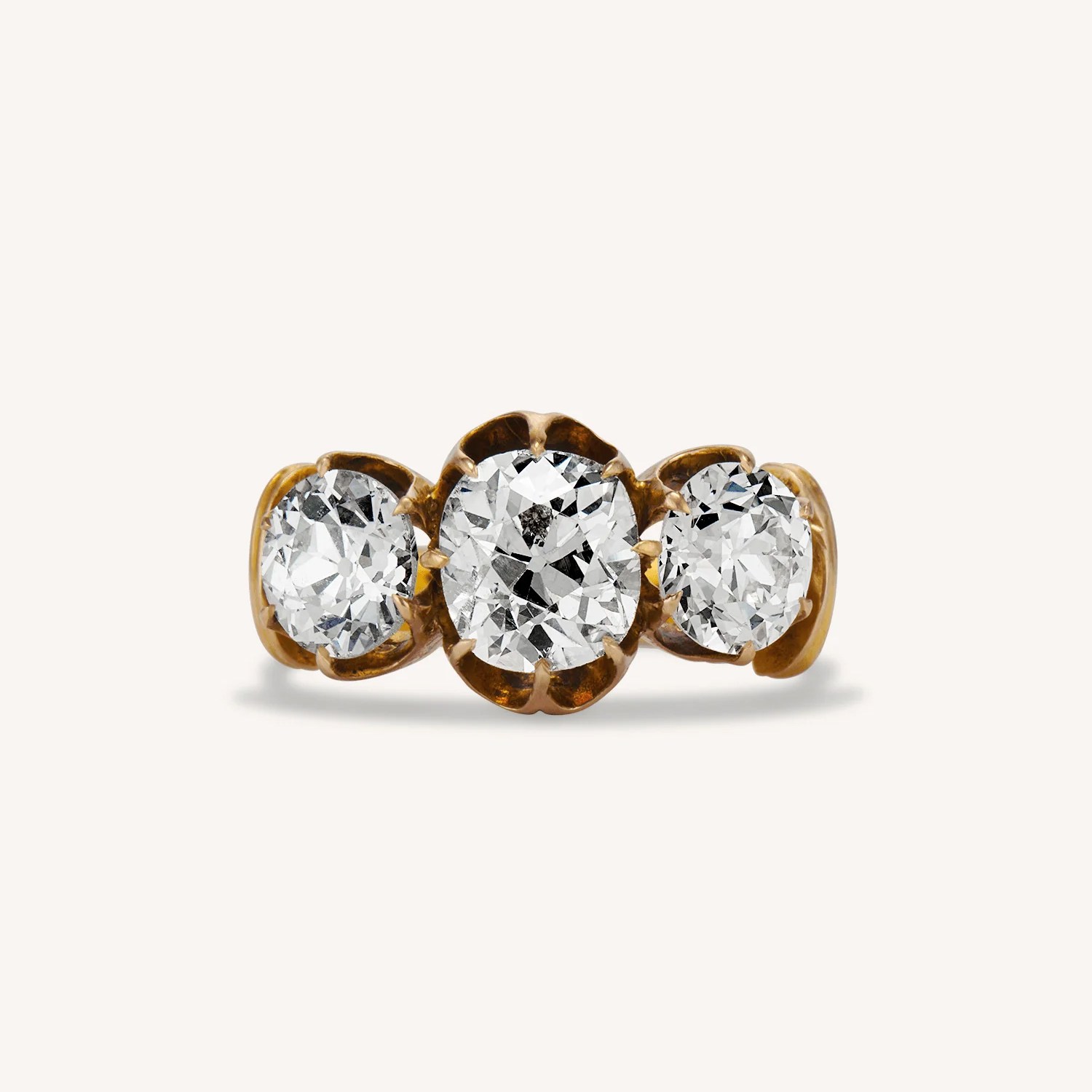 old mine cut diamond three stone ring