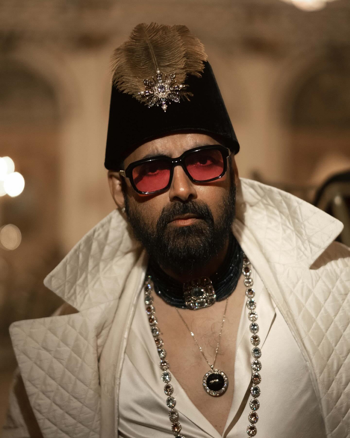 Sabyasachi wearing stacked custom polki diamond necklaces from Sabyasachi Fine Jewellery.