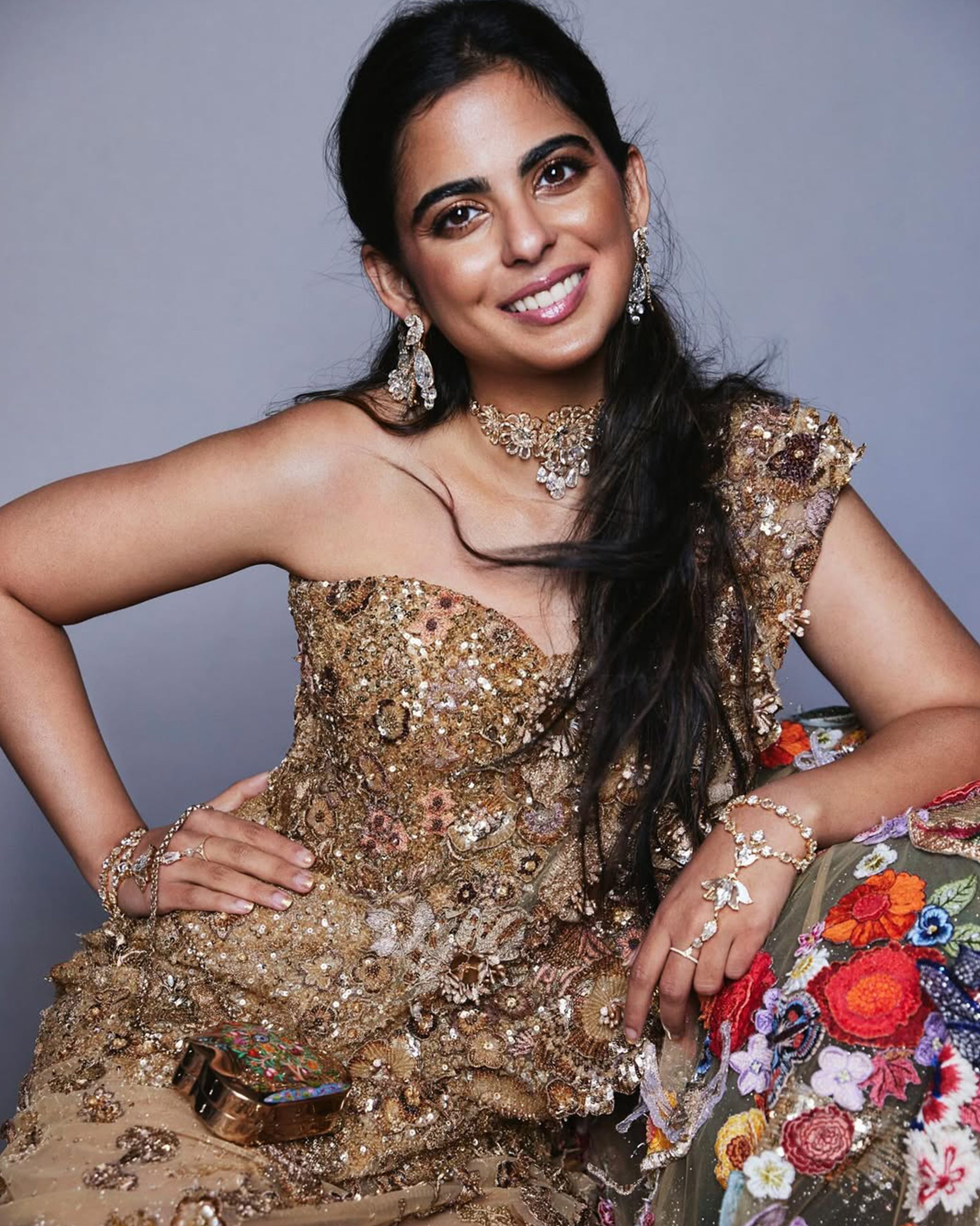 Lotus Haathpochas, parrot earrings, and floral choker by Viren Bhagat at the MET Gala 2024