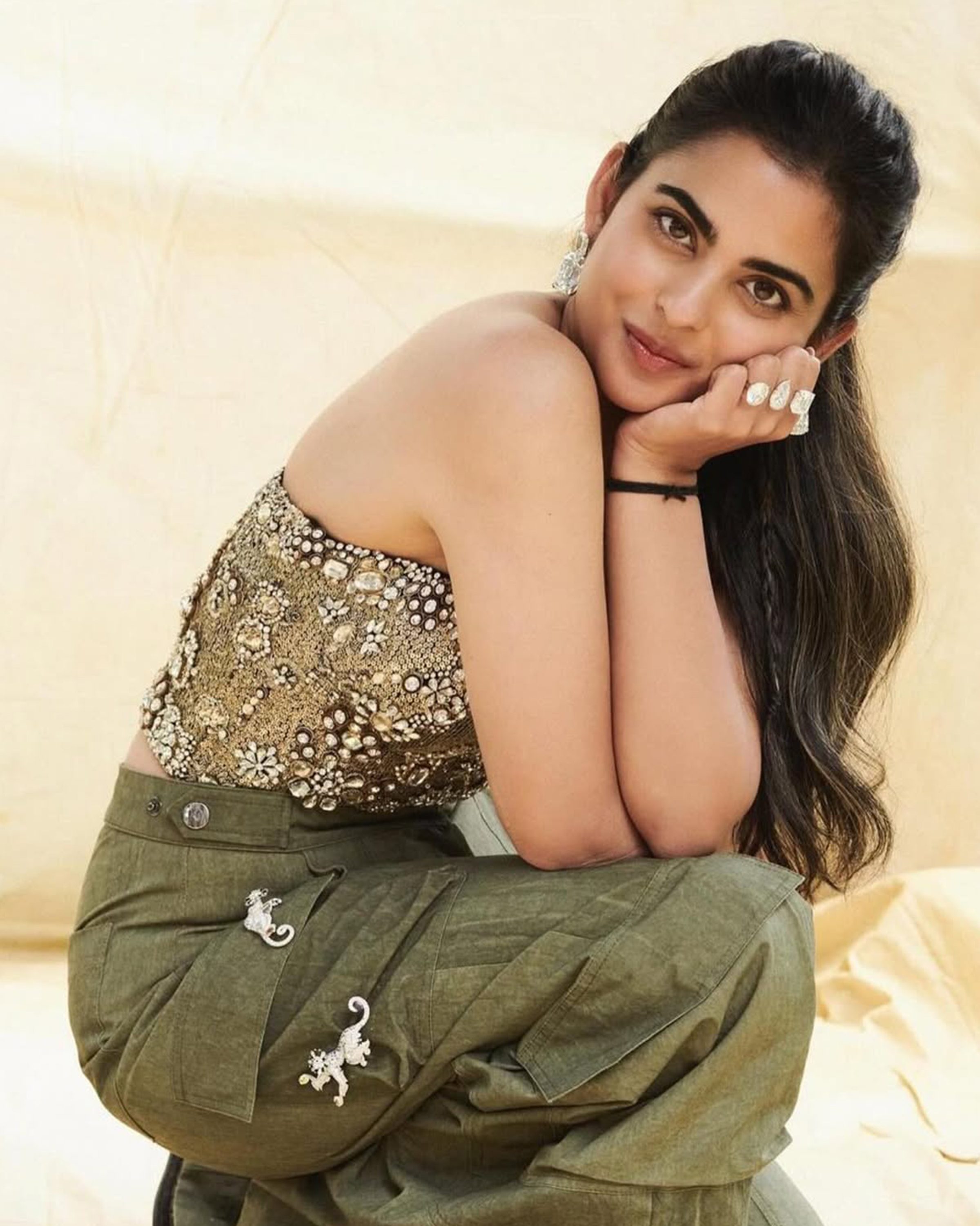 Isha Ambani wearing Van Cleef & Arpels 'Arche de Noe' collection monkey brooches