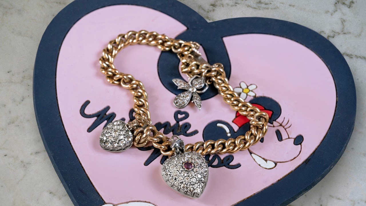 Learn all about Lynn Yaeger's Antique Jewelry shopping tips diamond heart charm bracelet