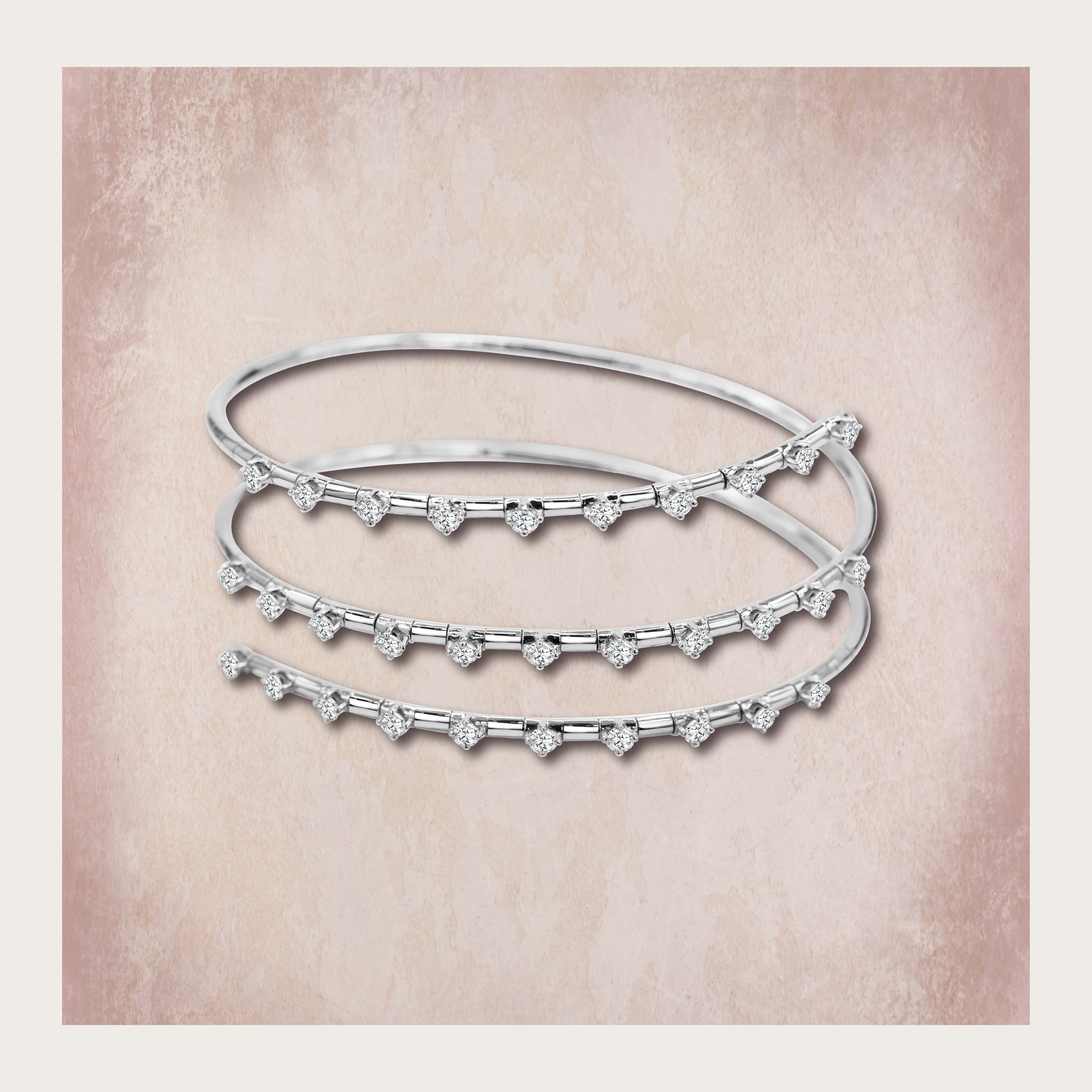 Triple layered alternating marquise and round-cut diamonds for a layered elegance