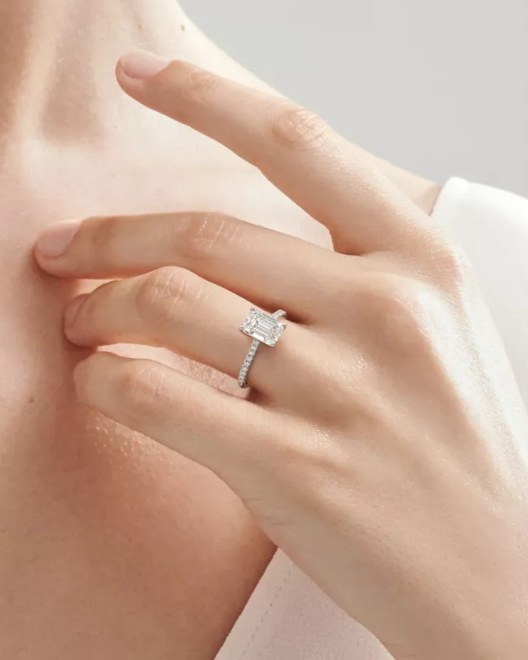 emerald cut step cut diamond ring