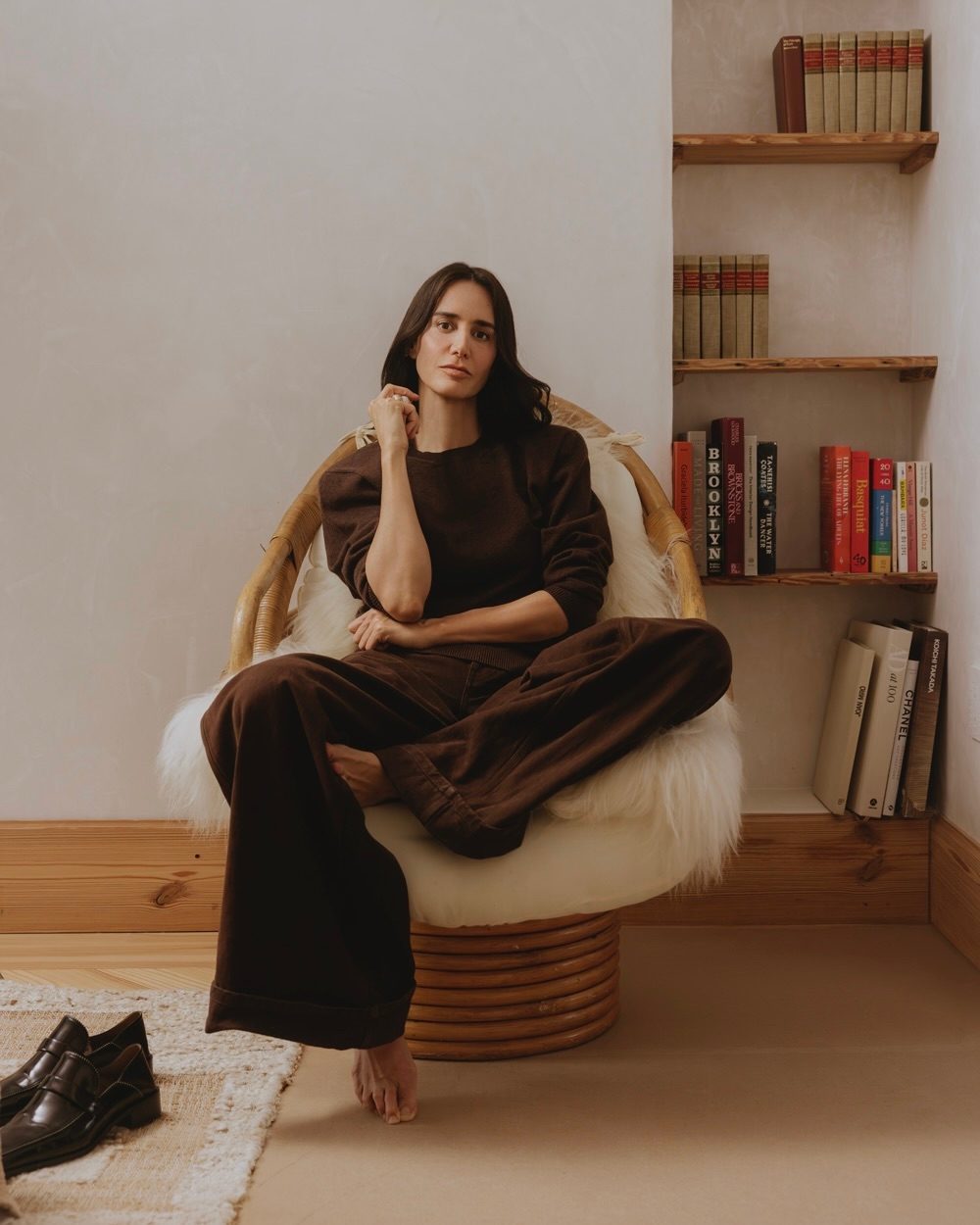 Ana Khouri rings featuring white diamonds and 18K Fairmined gold. Stella McCartney top and pants, Khouri’s own shoes.