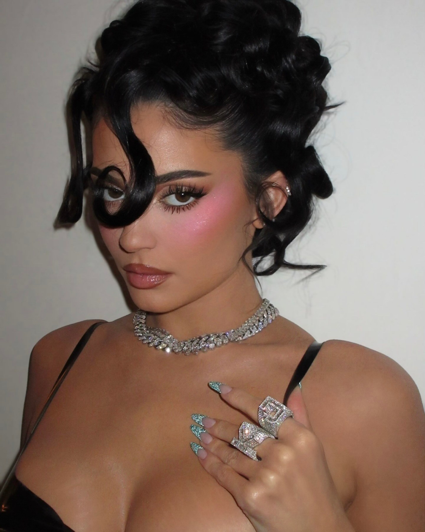 Kylie Jenner wears her diamond-encrusted XIV Karats initial rings on October 15, 2025. (Instagram: @kyliejenner)